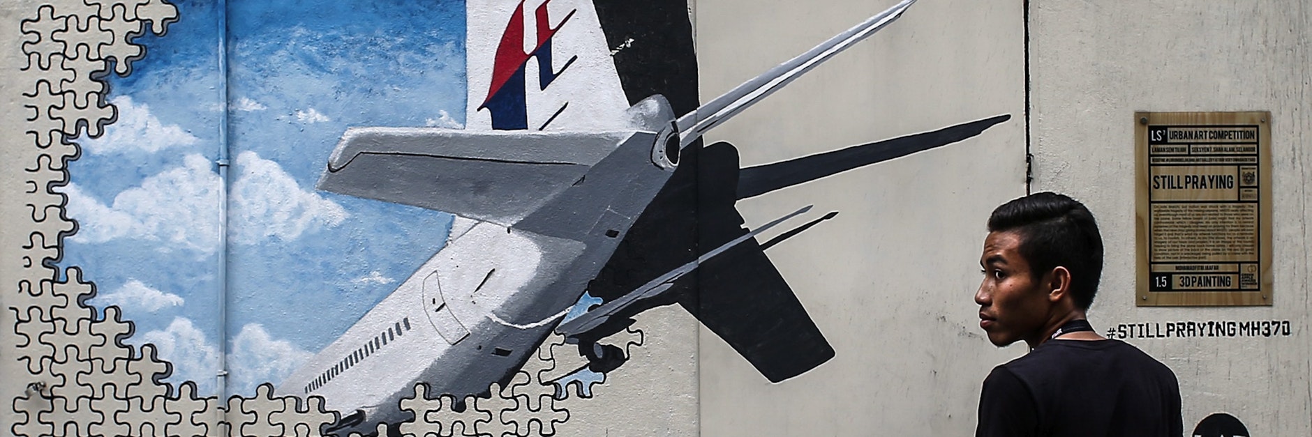 Ein Wandbild in Malaysia erinnert an das unheimliche  Verschwinden des Fluges  MH370.