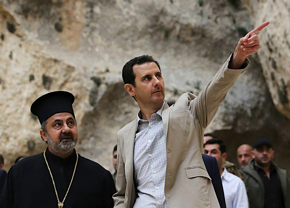 Assad besucht ein Dorf nahe Damaskus.