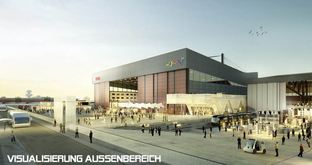 Umweltfreundlich: Elektrofahrzeuge rollen über das Flugfeld zu den Hangars.