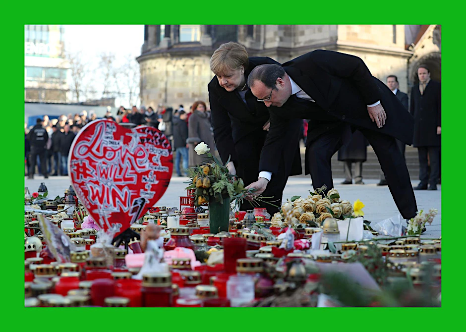 Breitscheidplatz: Angela Merkel und François Hollande legen am 27. Januar 2017 gemeinsam Rosen am Ort des Terroranschlags vom 19. Dezember 2016 in Berlin nieder.