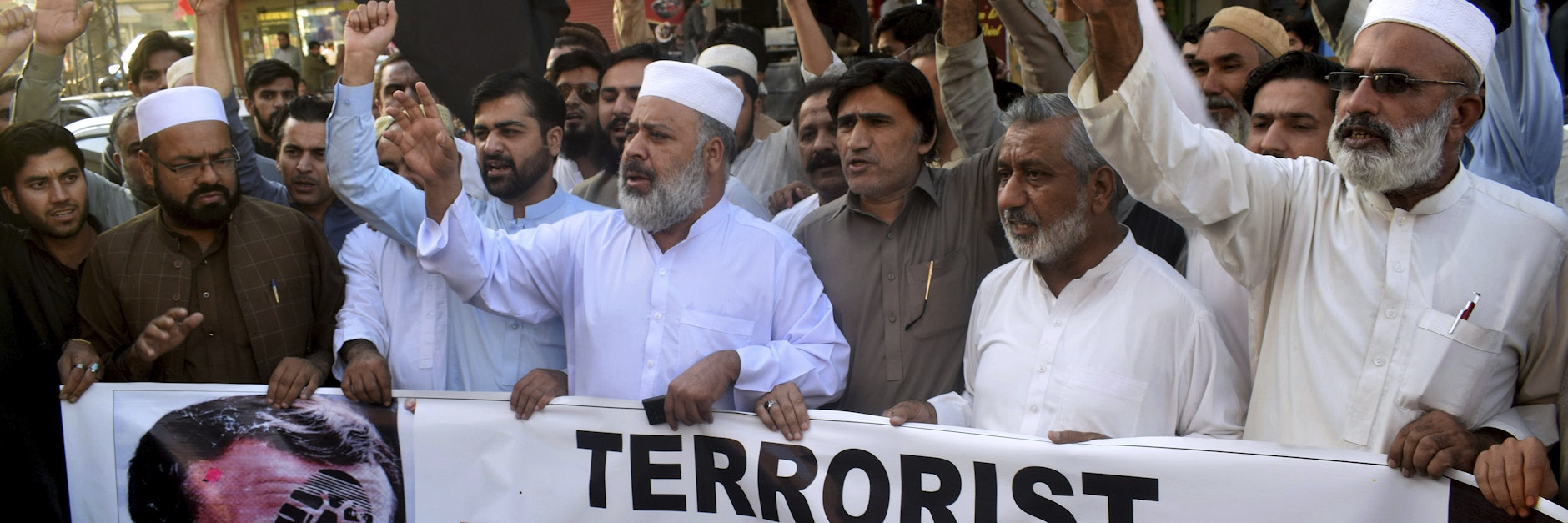 In Pakistan demonstrierten Händler gegen Frankreichs Präsidenten Macron: Sein Bild trägt einen Fußabdruck, Zeichen heftigster Geringschätzung.