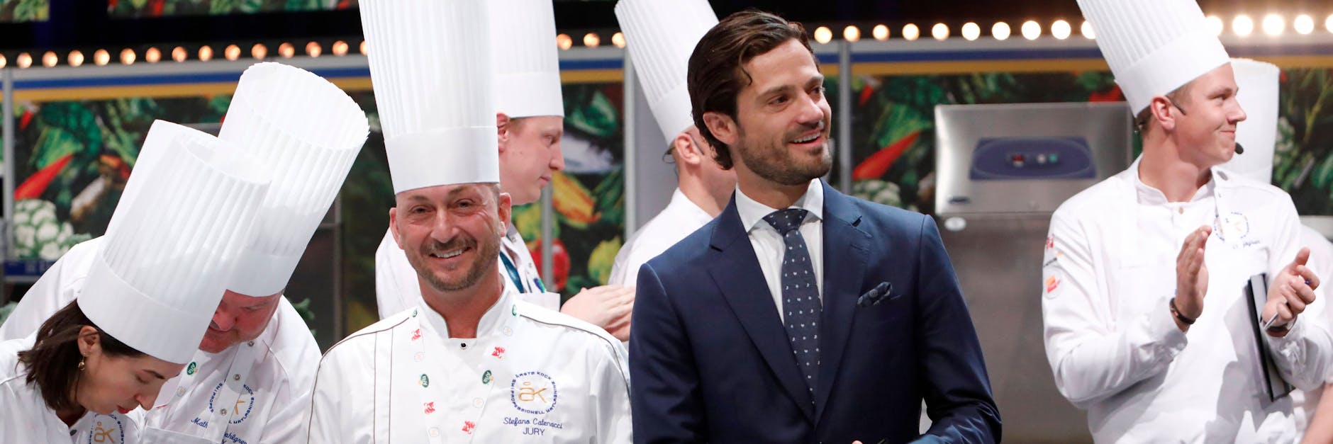 Stefano Catenacci (Mitte links) mit Prinz Carl Philip von Schweden (im dunklen Anzug).
