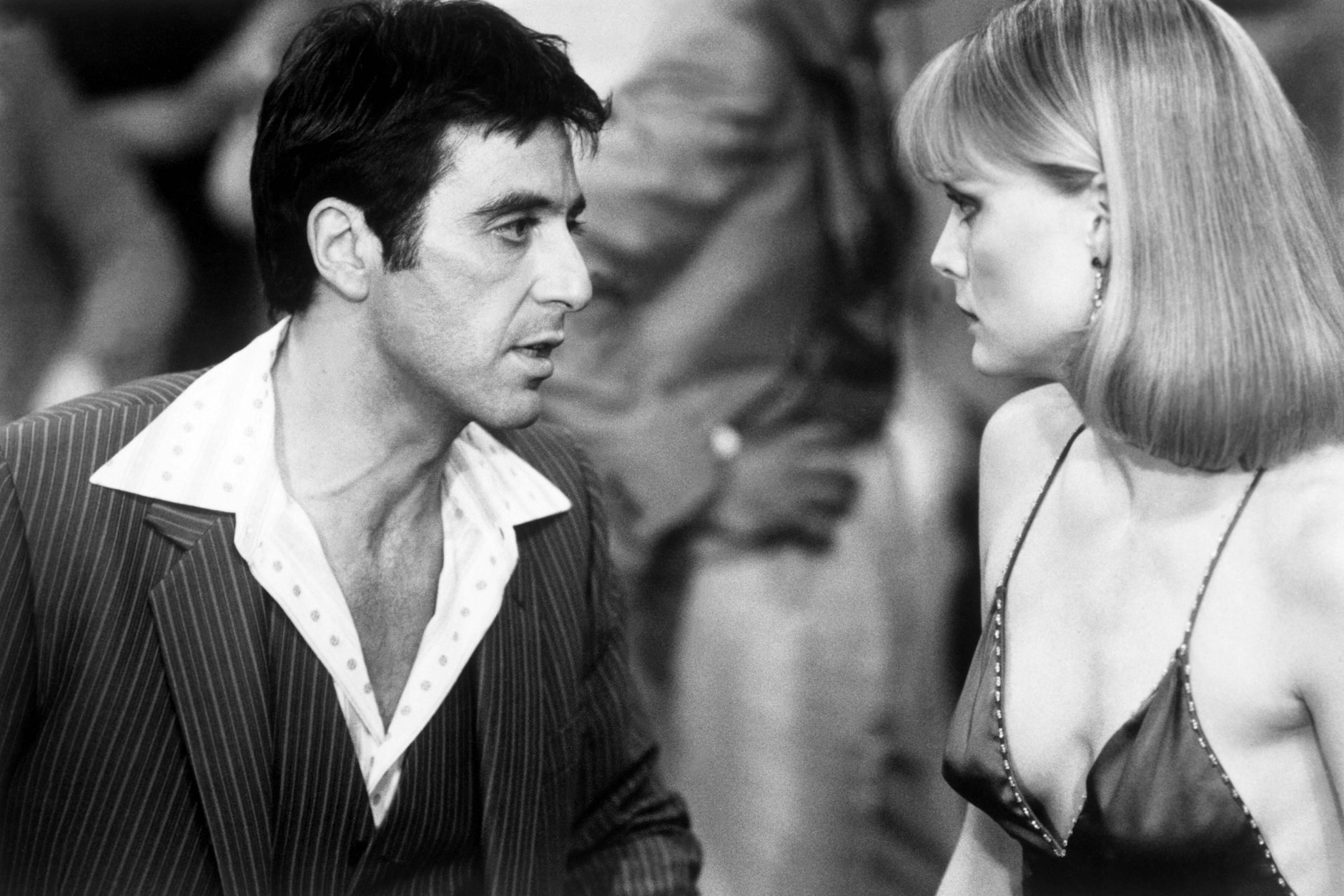 Al Pacino als Tony Montana und Michelle Pfeiffer als Elvira Montana  in „Scarface“.
