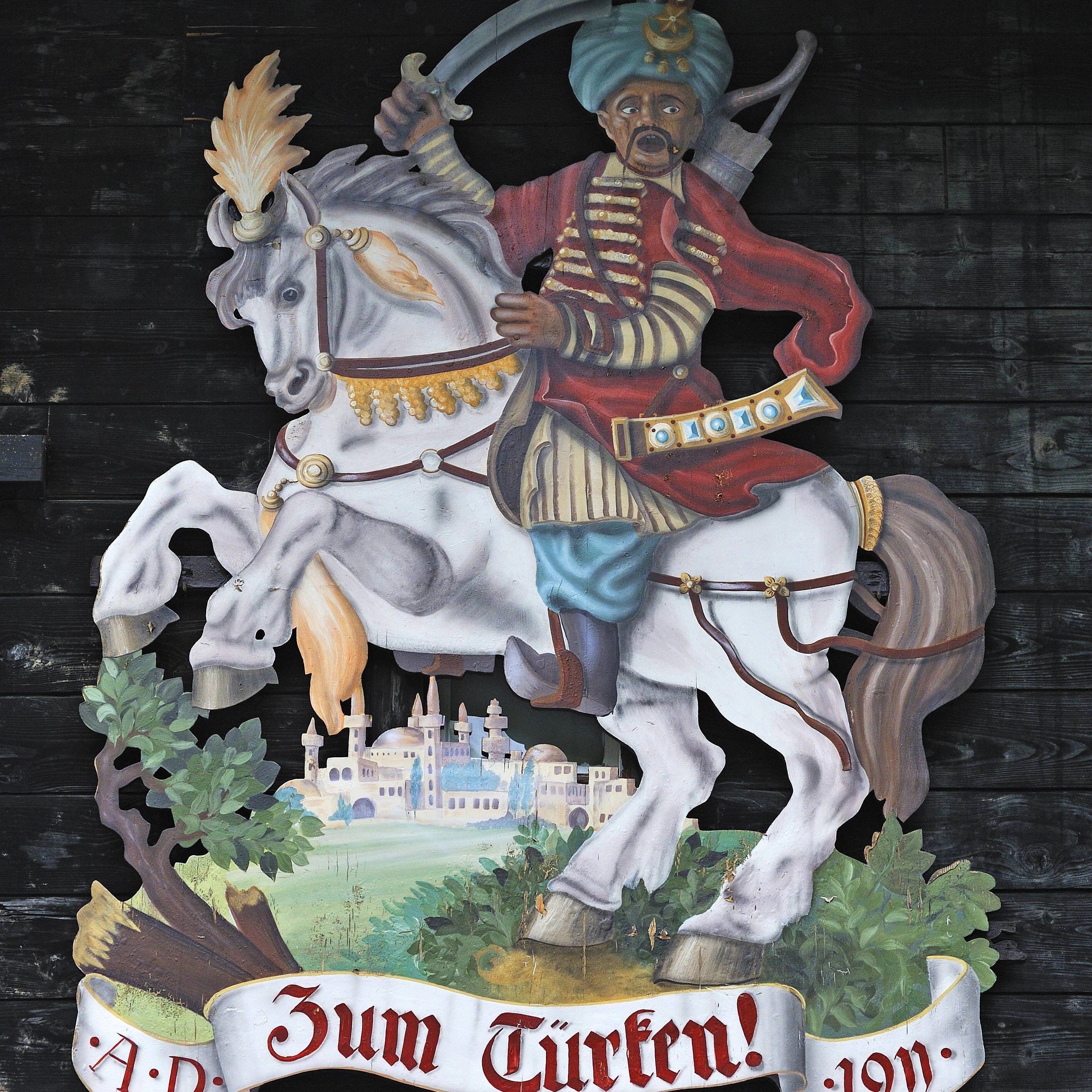 Gemälde eines reitenden Türken am Hotel Zum Türken.