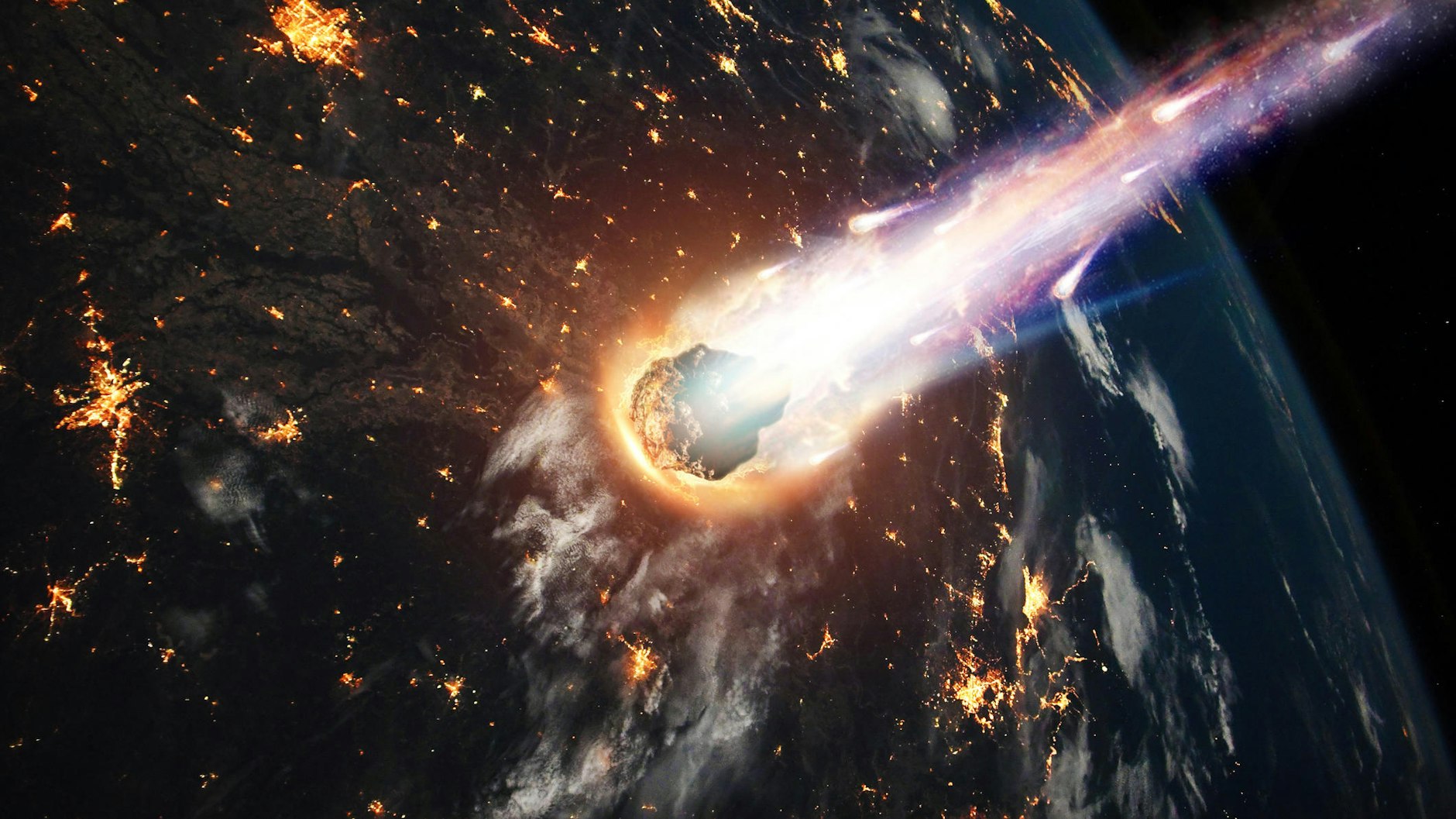 Ein Asteroid fliegt auf die Erde zu und verglüht in der Erdatmosphäre. So etwas kann jederzeit geschehen.