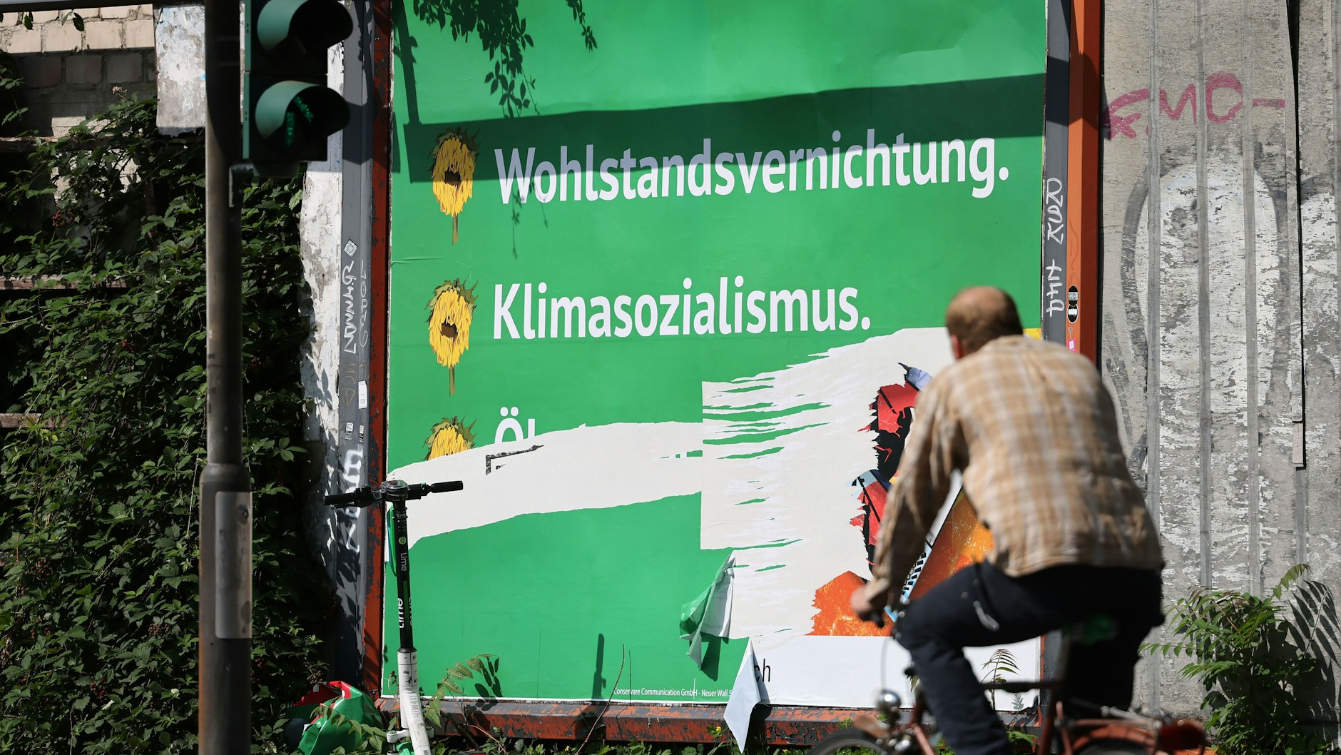 An anti-Green poster bearing the slogans "wealth destruction" and "climate socialism"