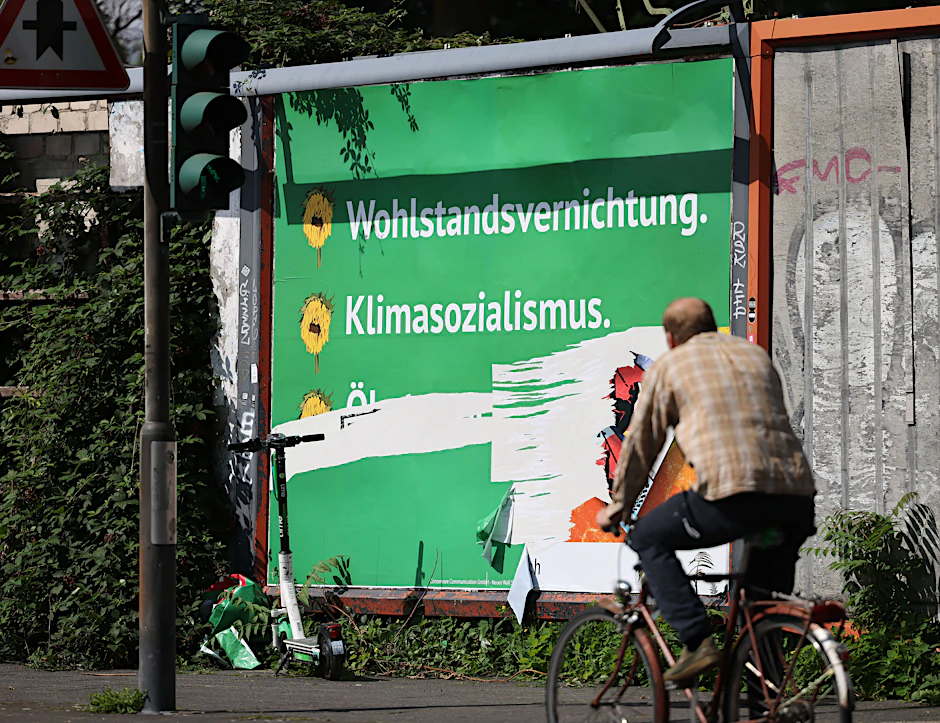 An anti-Green poster bearing the slogans "wealth destruction" and "climate socialism"