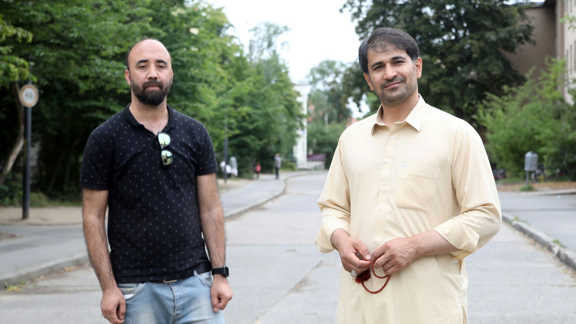 Waheed Omid and Babul Nabizada.