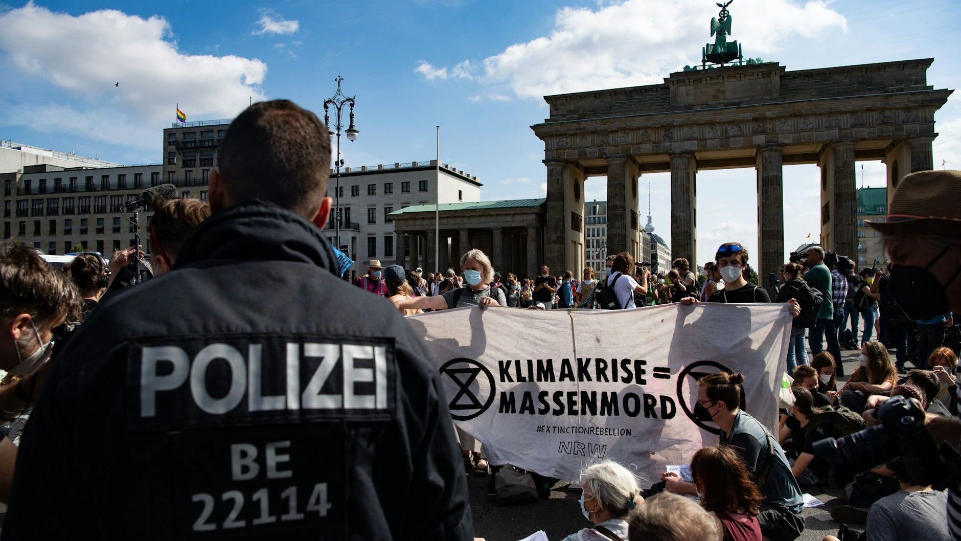 Climate protesters at Brandenburg Gate Monday morning.