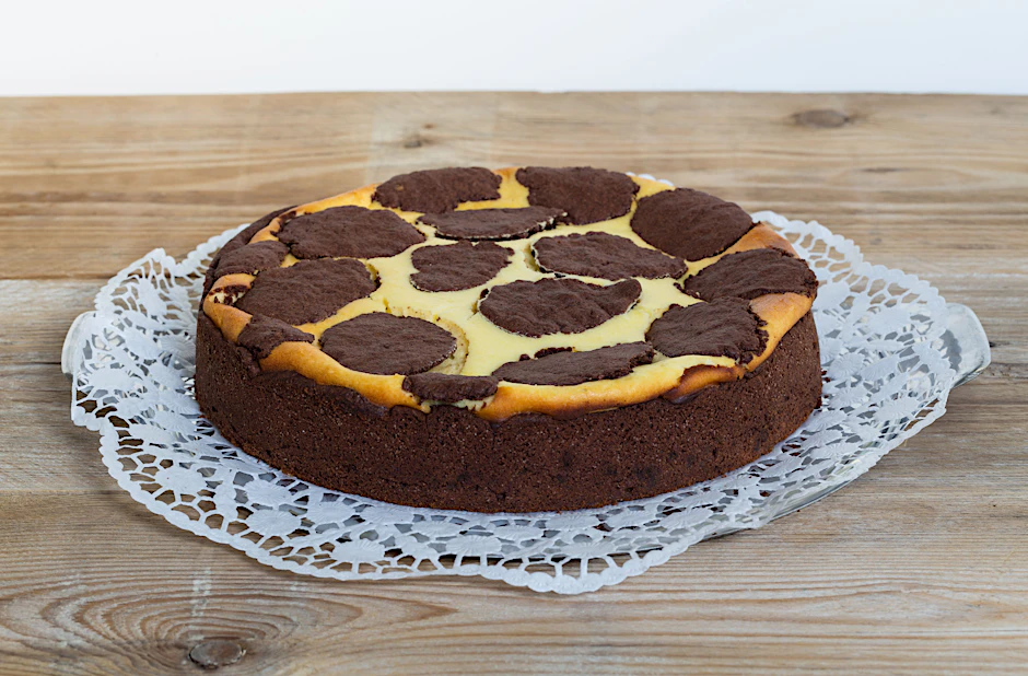 Leckerer Käsekuchen mit einer feinen Note Kakao - der Russische Zupfkuchen ist einfach der Hammer. Vor allem nach diesem Rezept.
