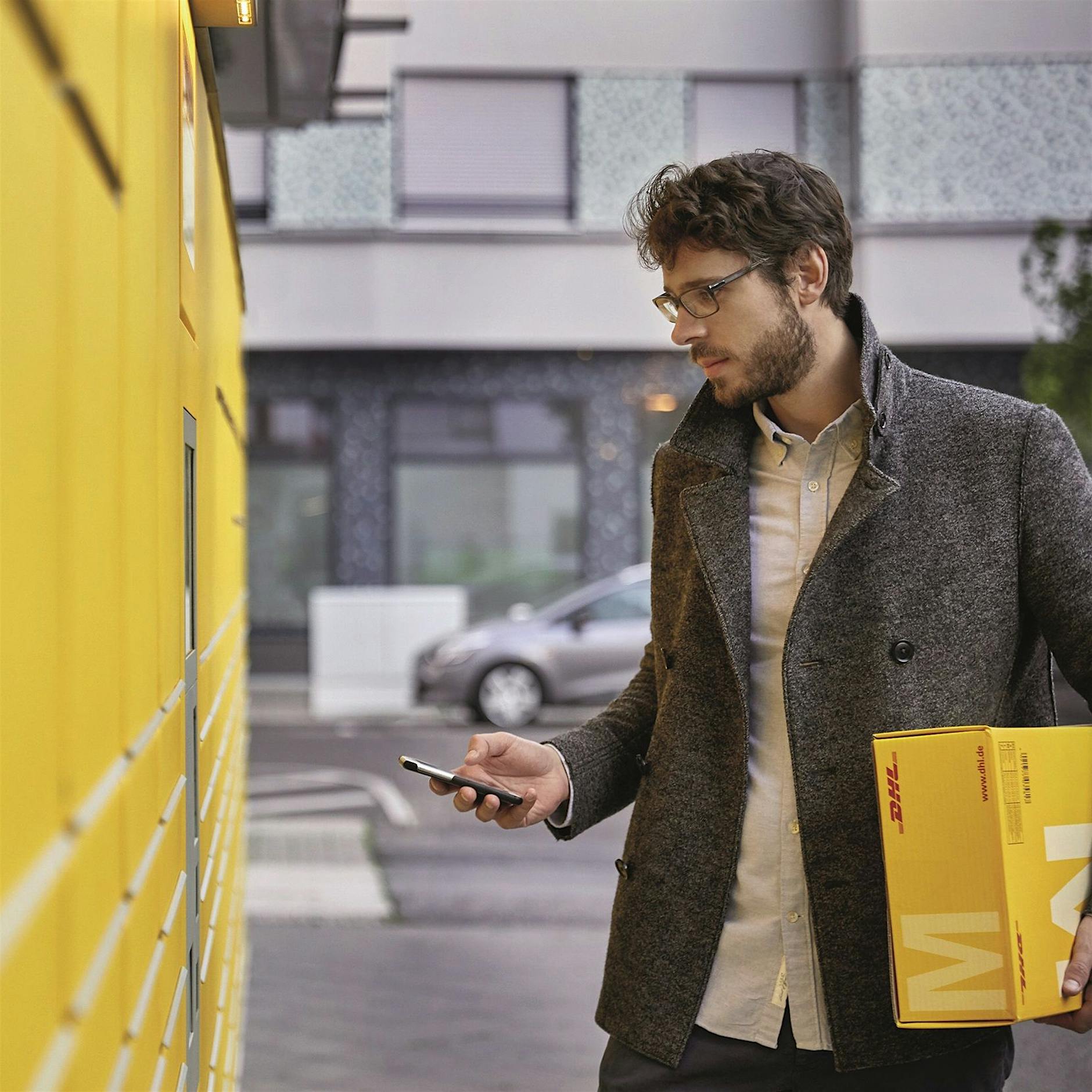 DHL: So können Sie jetzt Pakete mit dem QR-Code abholen