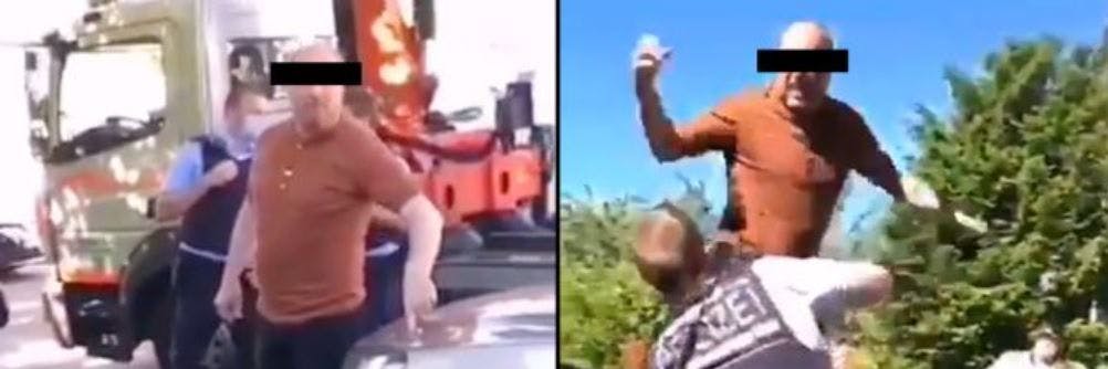 Der Mann wehrt sich rustikal gegen das Abschleppen seines Autos.