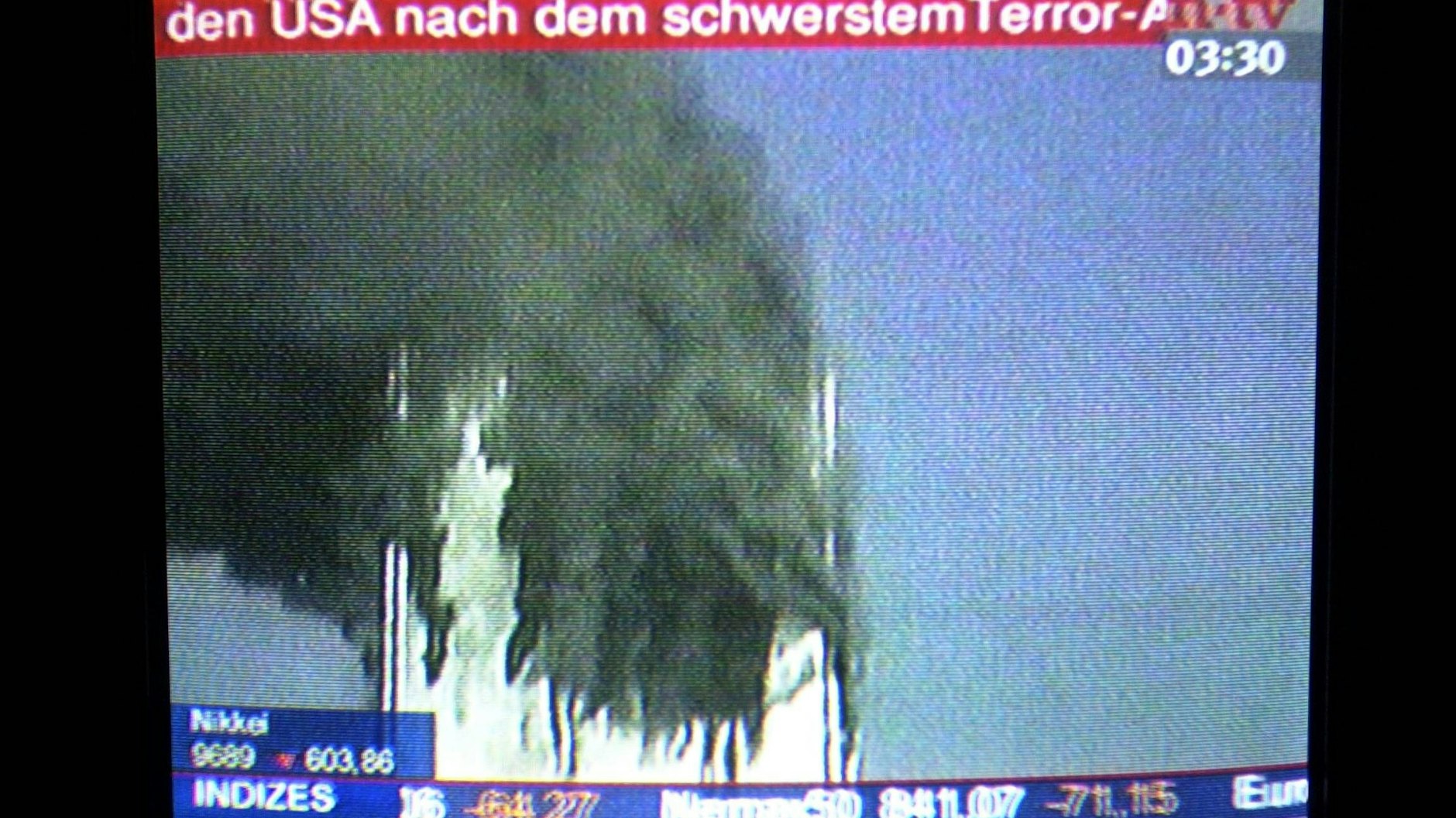 Fernsehberichterstattung über die Terroranschläge.