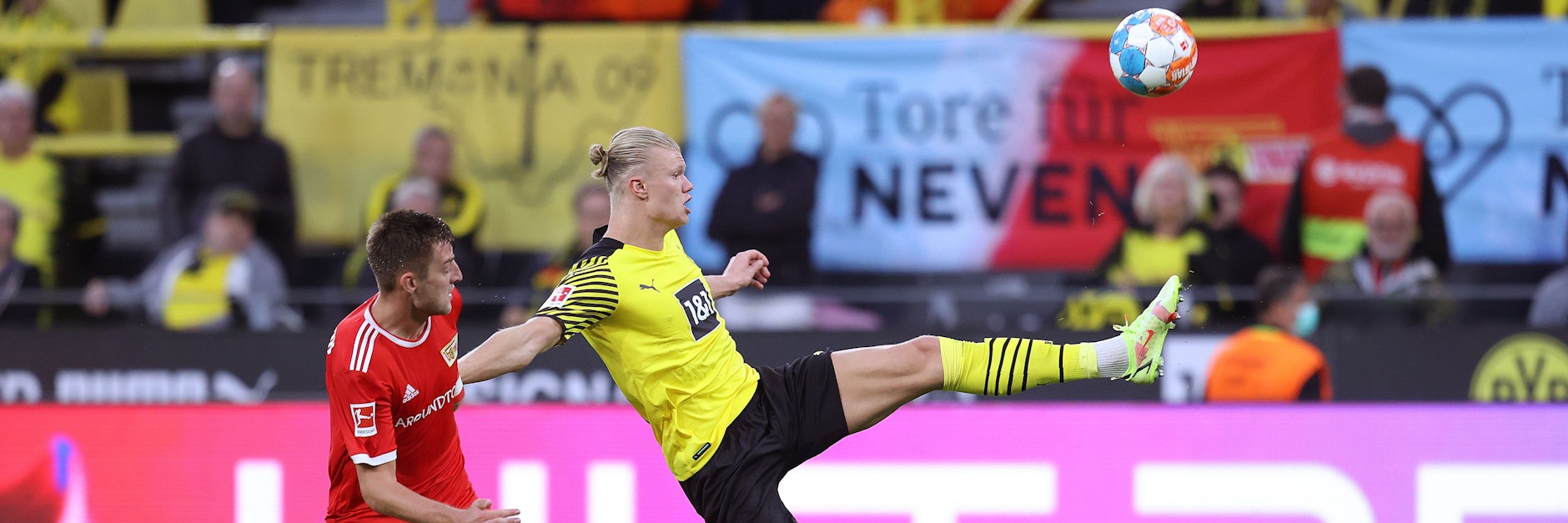 Robin Knoche (l.) – hier im Duell mit Erling Haaland – droht das Spiel der Eisernen gegen Bielefeld zu verpassen. Wenn es ganz dumm läuft, sogar mehr als nur den einen Kick.