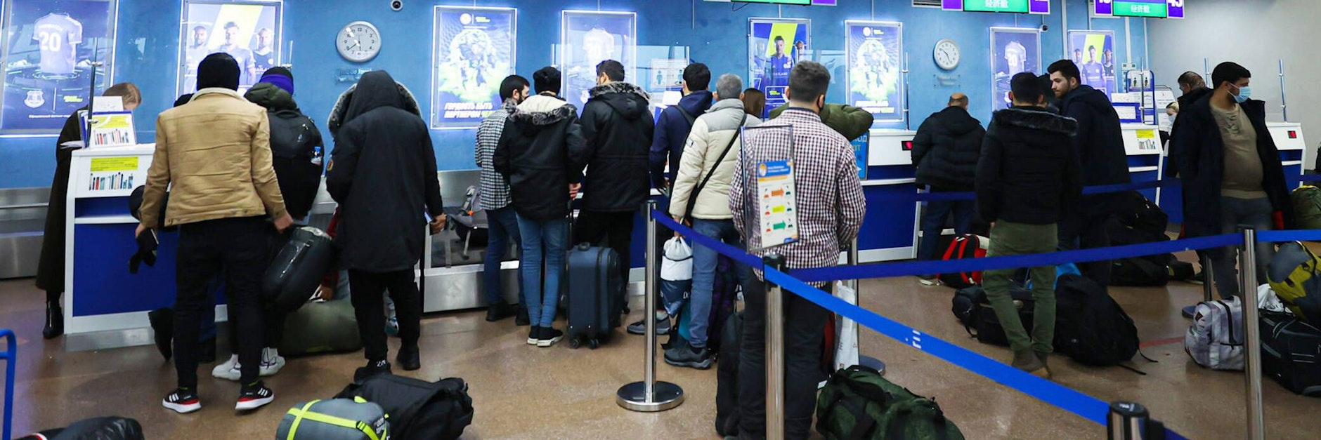 Flughafen Minsk. Iraker checken für ihre Rückkehr nach Bagdad ein.