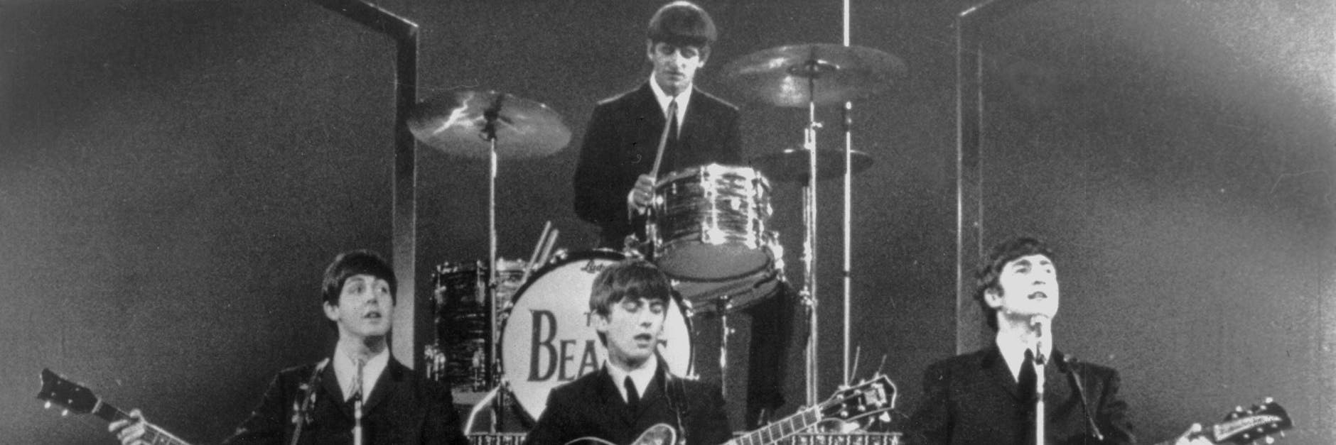 Die Beatles bei einem Londoner Auftritt im Februar 1964: Paul McCartney, George Harrison, Ringo Starr und John Lennon (v.l.).