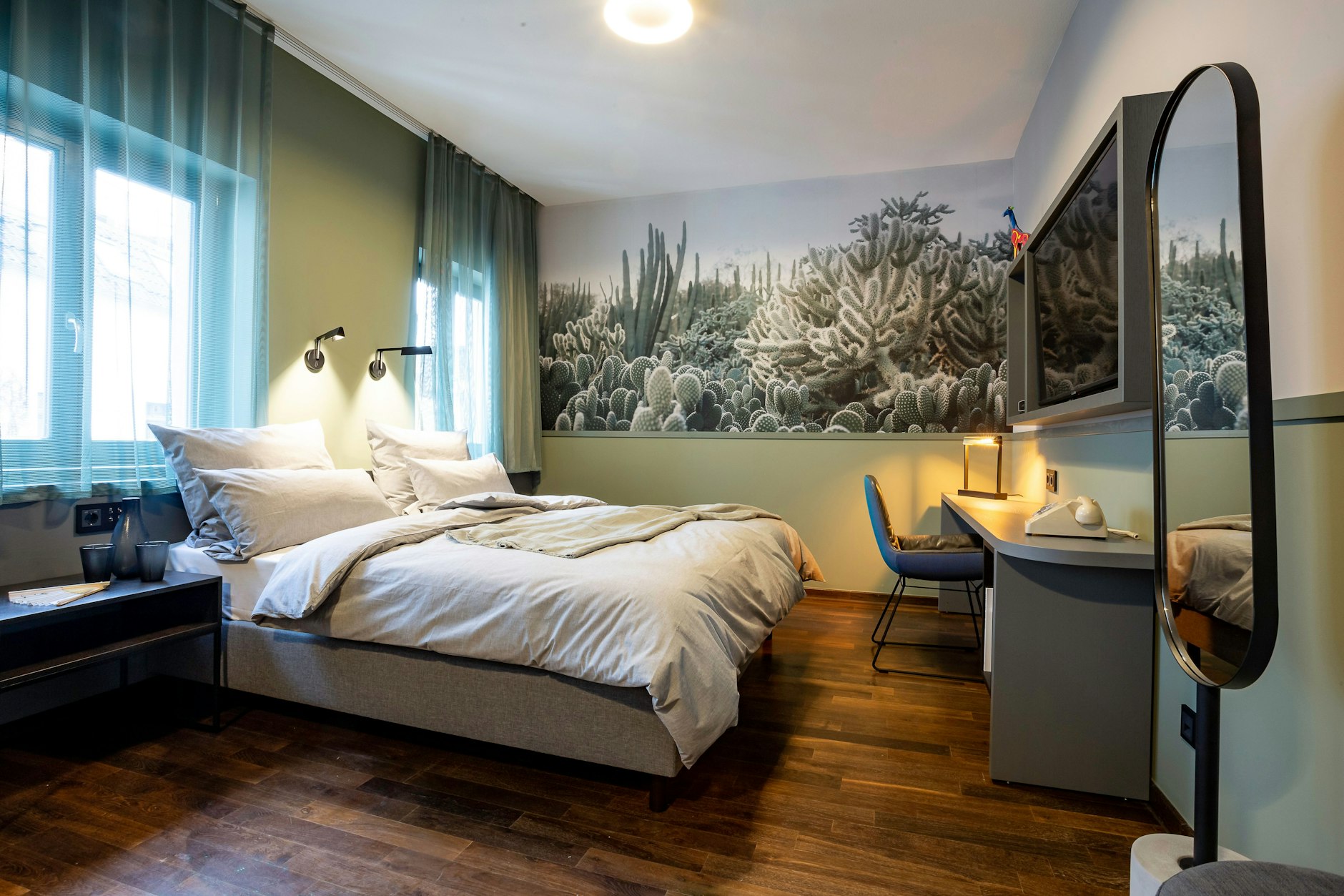 Nur die Ruhe: Im Gegensatz zu früher sind die Farben des neuen Circus dezenter geworden, mit coolen Kakteen und grauer Bettwäsche.