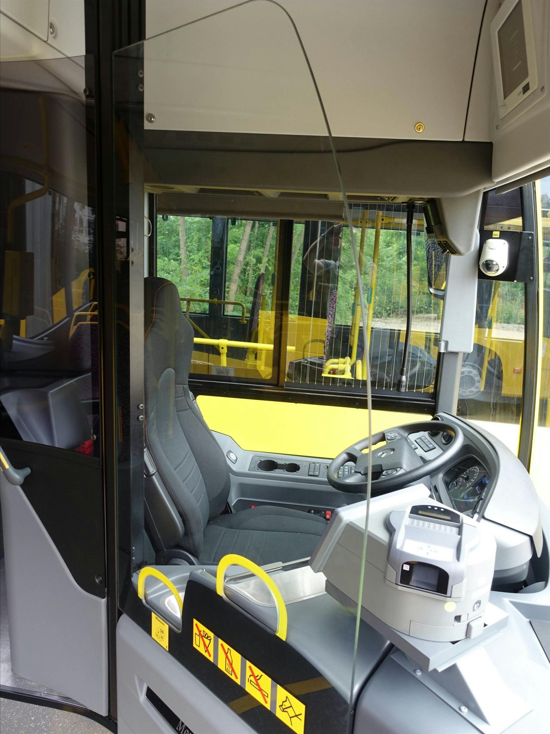 A glass pane protects drivers from harmful aerosols.