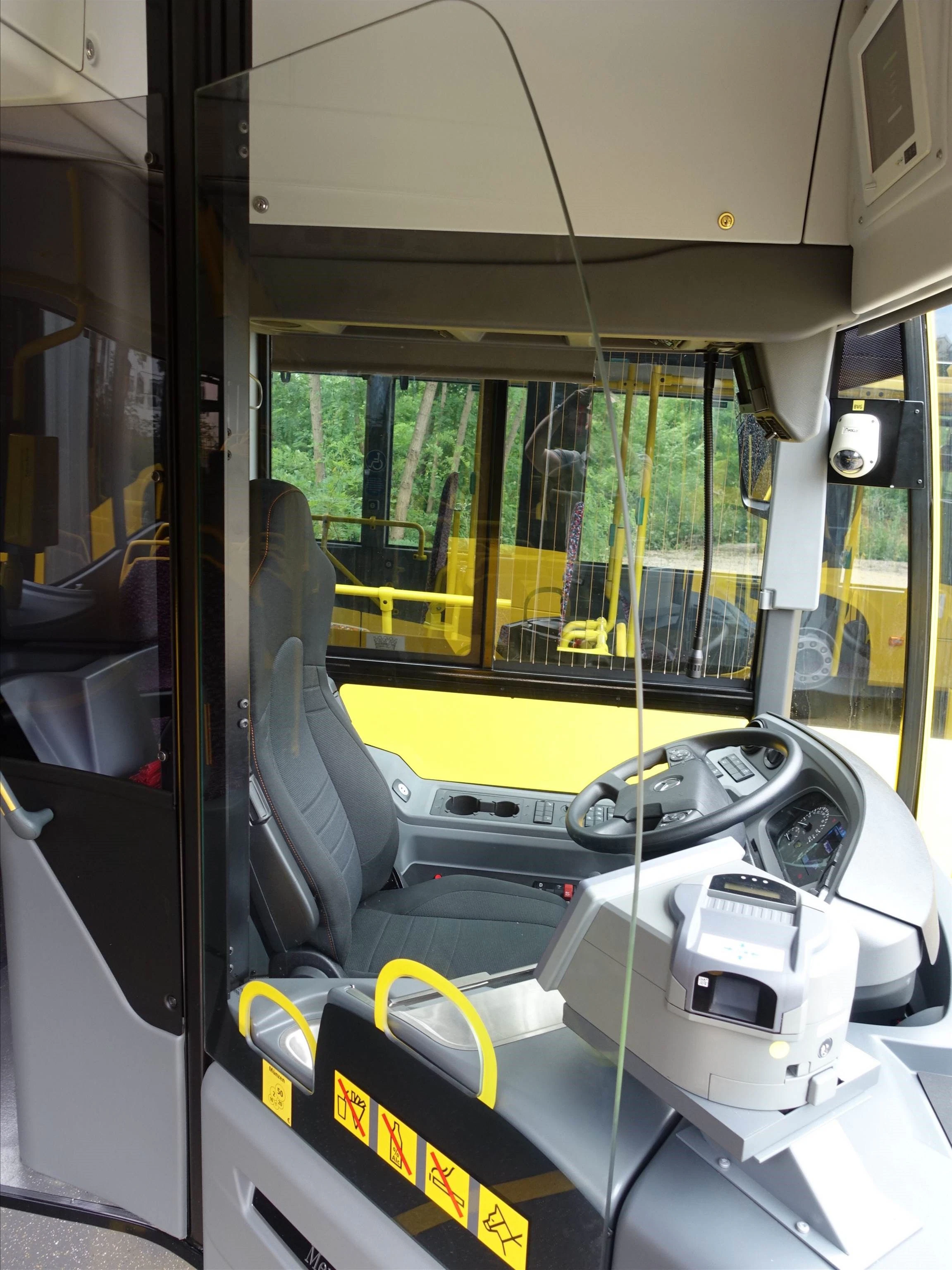 A glass pane protects drivers from harmful aerosols.