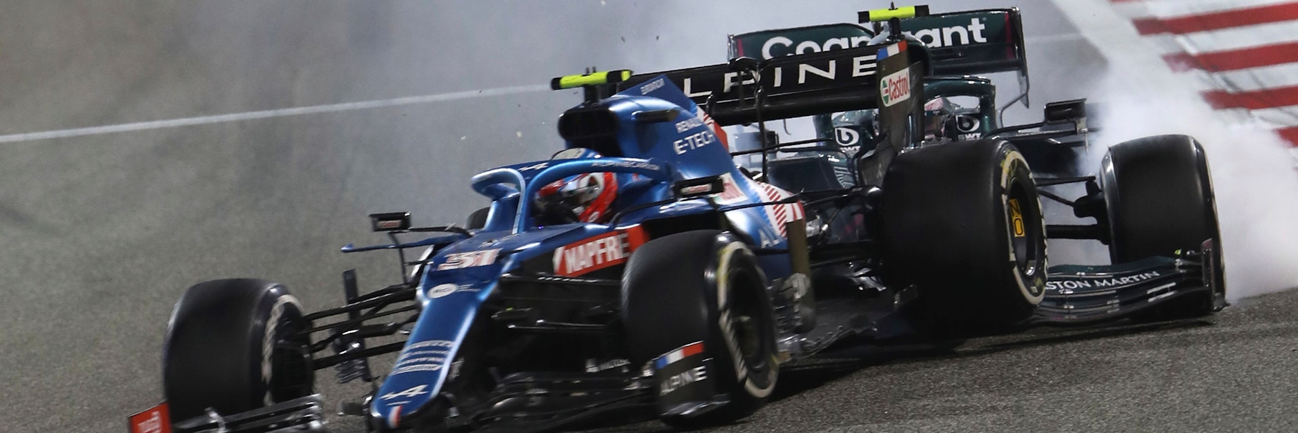 Kaum zu erkenne, aber zählen Sie mal die Reifen: Sebastian Vettel (h.) rauscht Esteban Ocon ins Heck.