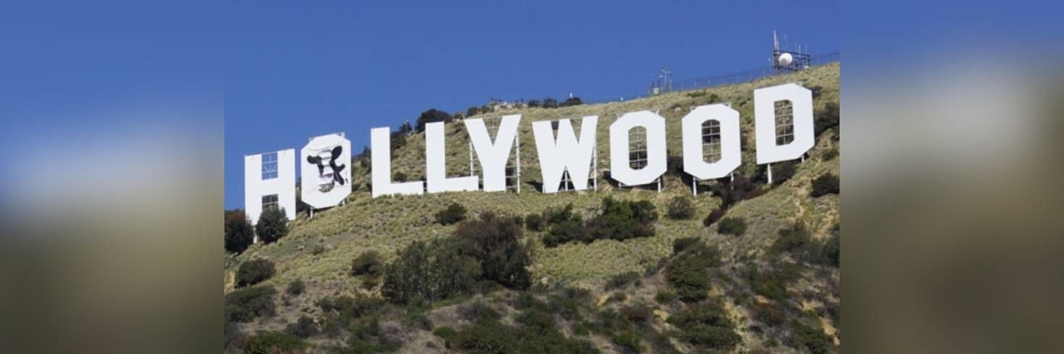 What is the cow portrait doing on the famous Hollywood sign?