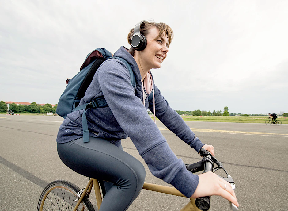 Wearing headphones while cycling is not verboten.