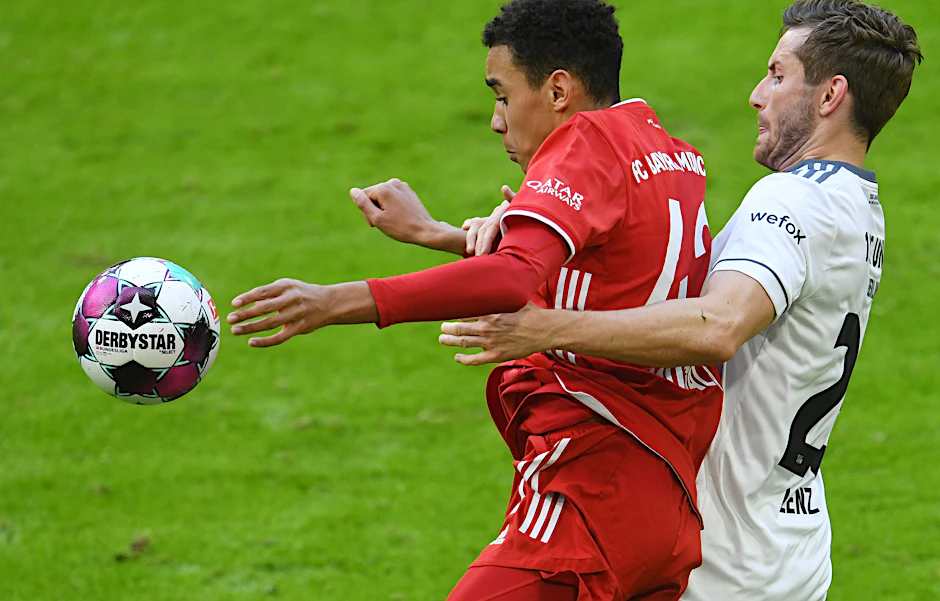 Mittlerweile ein gestandener Bundesligaprofi: Unions Christopher Lenz (r.) hier im Duell mit Bayern Münchens Jamal Musiala.