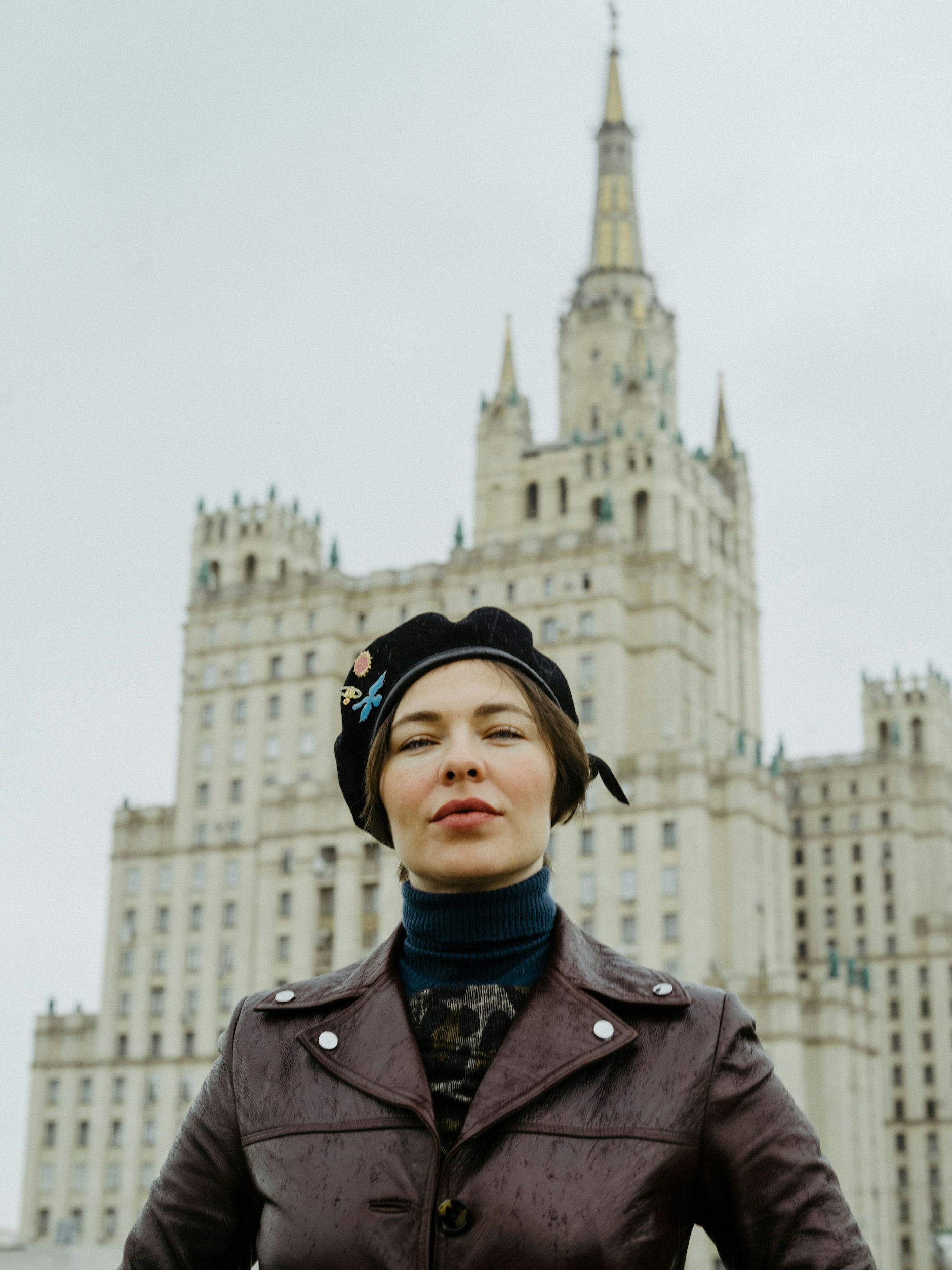 Nina Kraviz in front of the famous apartment building at Kudrinskaya Square.