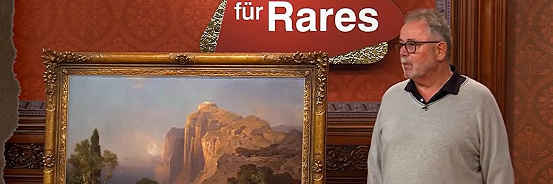 Kandidat Harald Puschmann mit seinem Gemälde im Händlerraum bei Bares für Rares. Für den alten Schinken gab es richtig viel Geld.