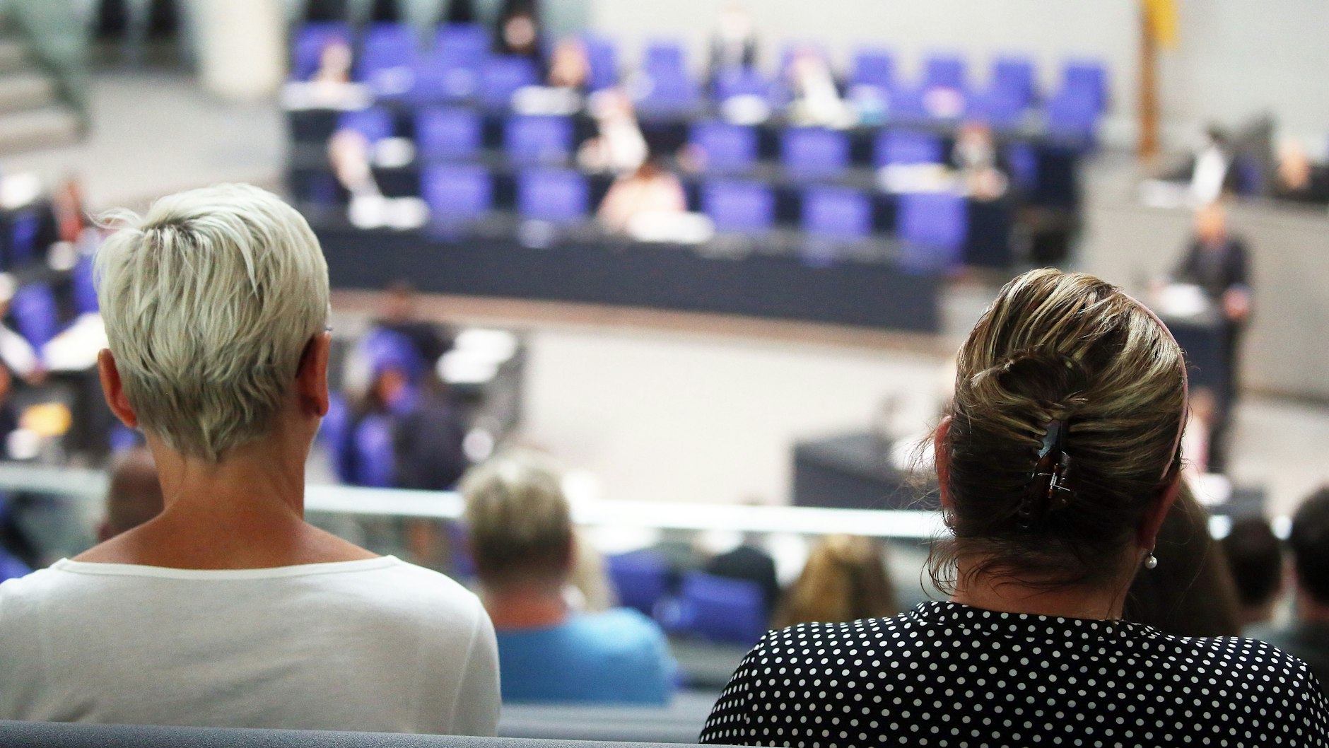 Relatives of the victims follow the debate on the final report of the parliamentary investigation into the Breitscheidplatz terrorist attack from the Bundestag visitors' gallery.