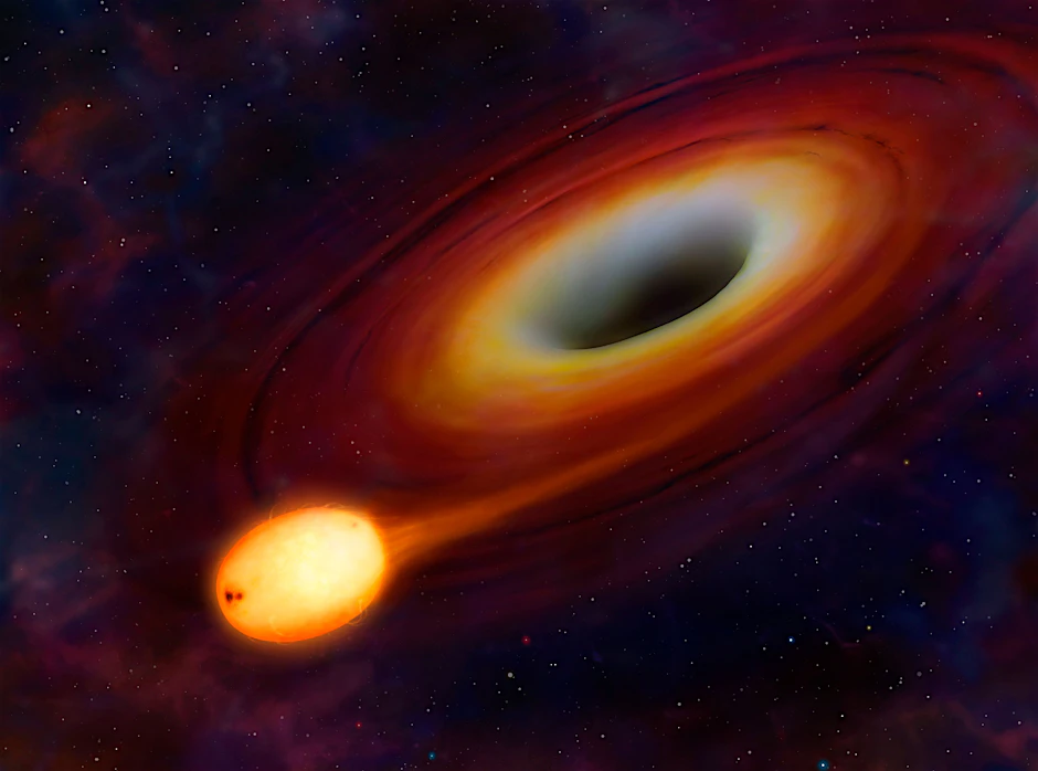 Die grafische Darstellung zeigt einen Stern, der von einem Schwarzen Loch im Weltall eingesogen und zerrissen wird. Es handelt sich in der Grafik nicht um einen Neutronenstern.&nbsp;