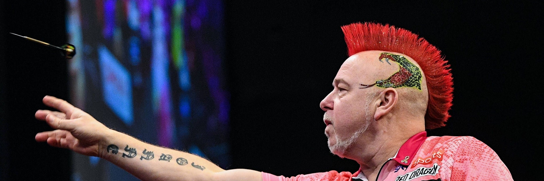Mit der Schlange am Haupt und der bunten Irokesenfrisur: Darts-Weltmeister Peter Snakebite Wright ist einer der Publikumslieblinge.