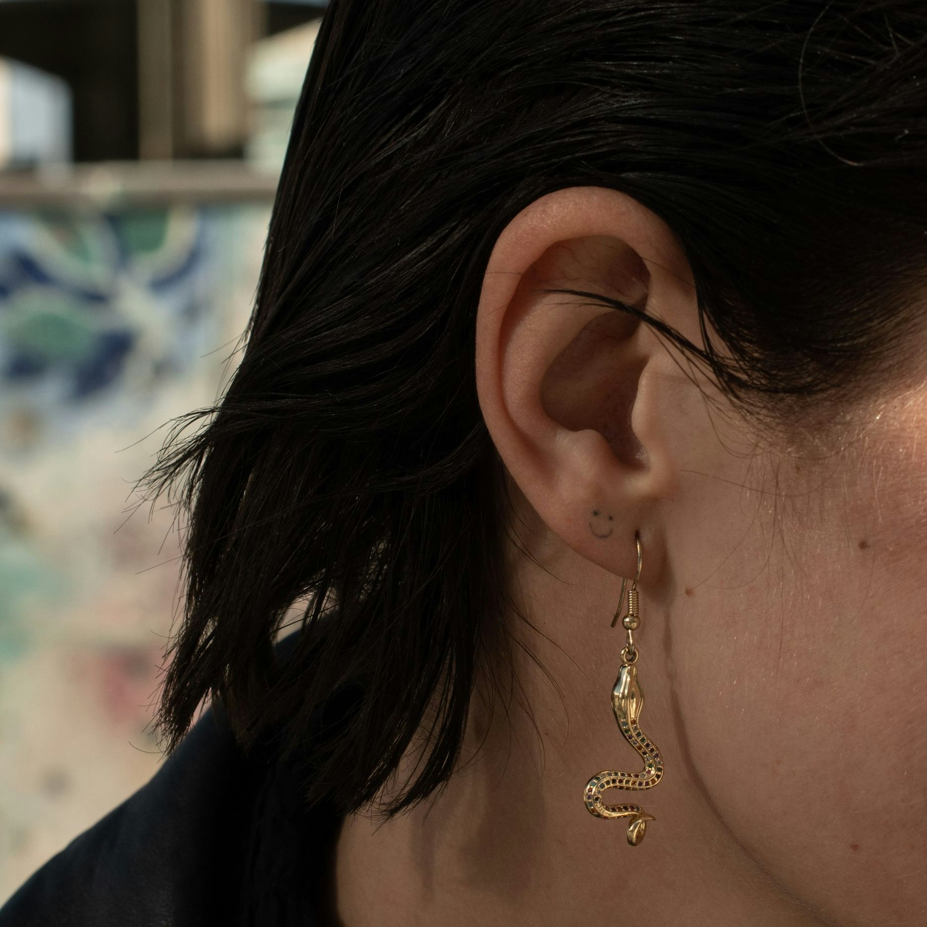 Keep smiling: Ein Tattoo als Appell an das Lächeln.