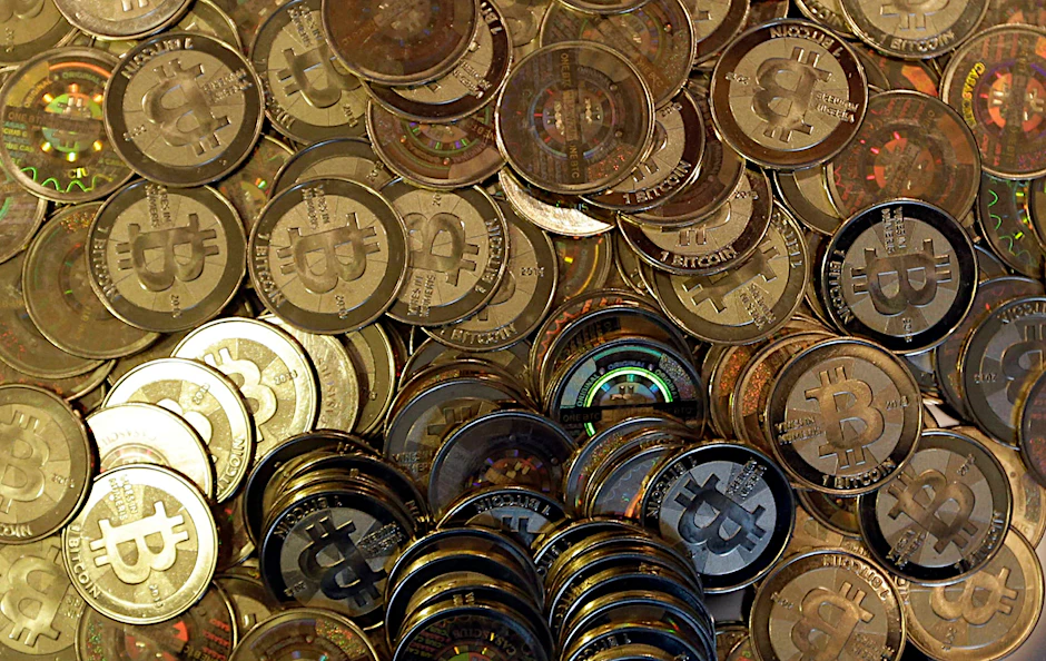 Man kann Bitcoins auch als Goldtaler kaufen, wodurch sie Sammlerstück und Wertanlage zugleich sind.
