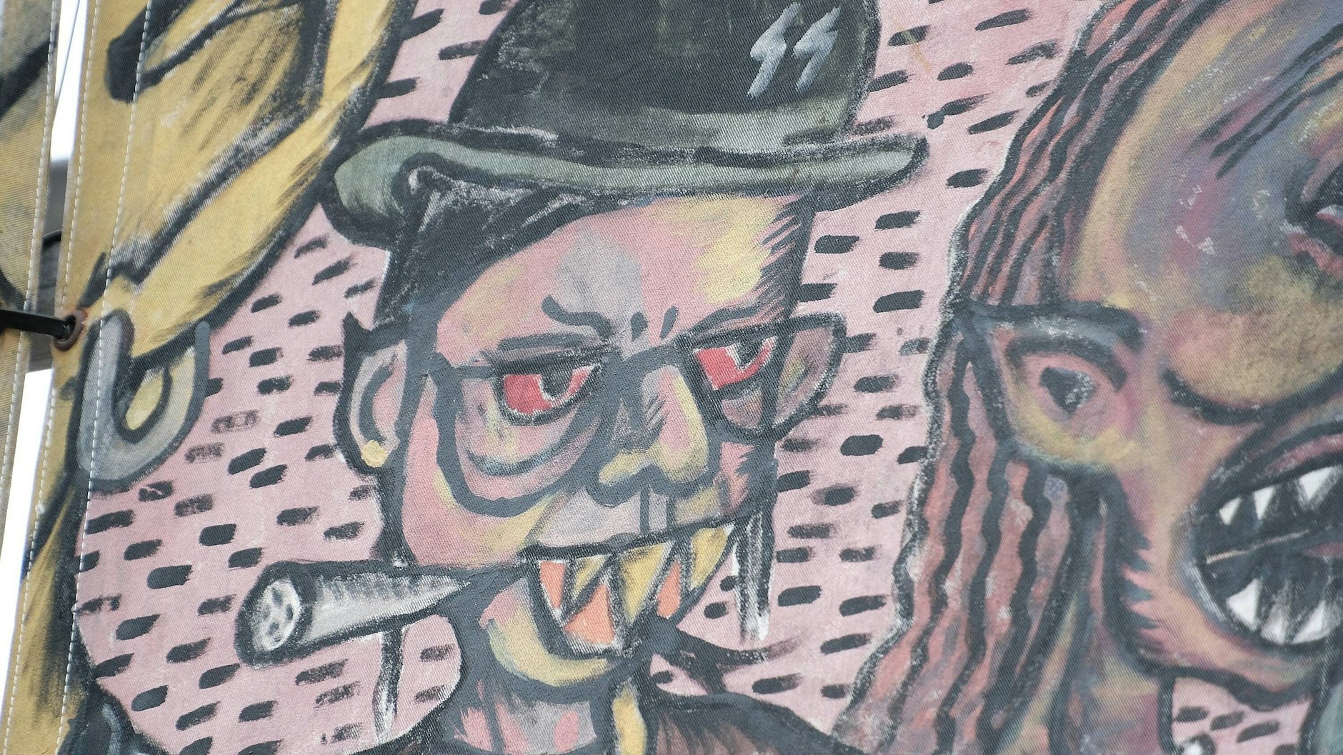 Banner des indonesischen Künstlerkollektivs Taring Padi mit eindeutig antisemitischen Darstellungen