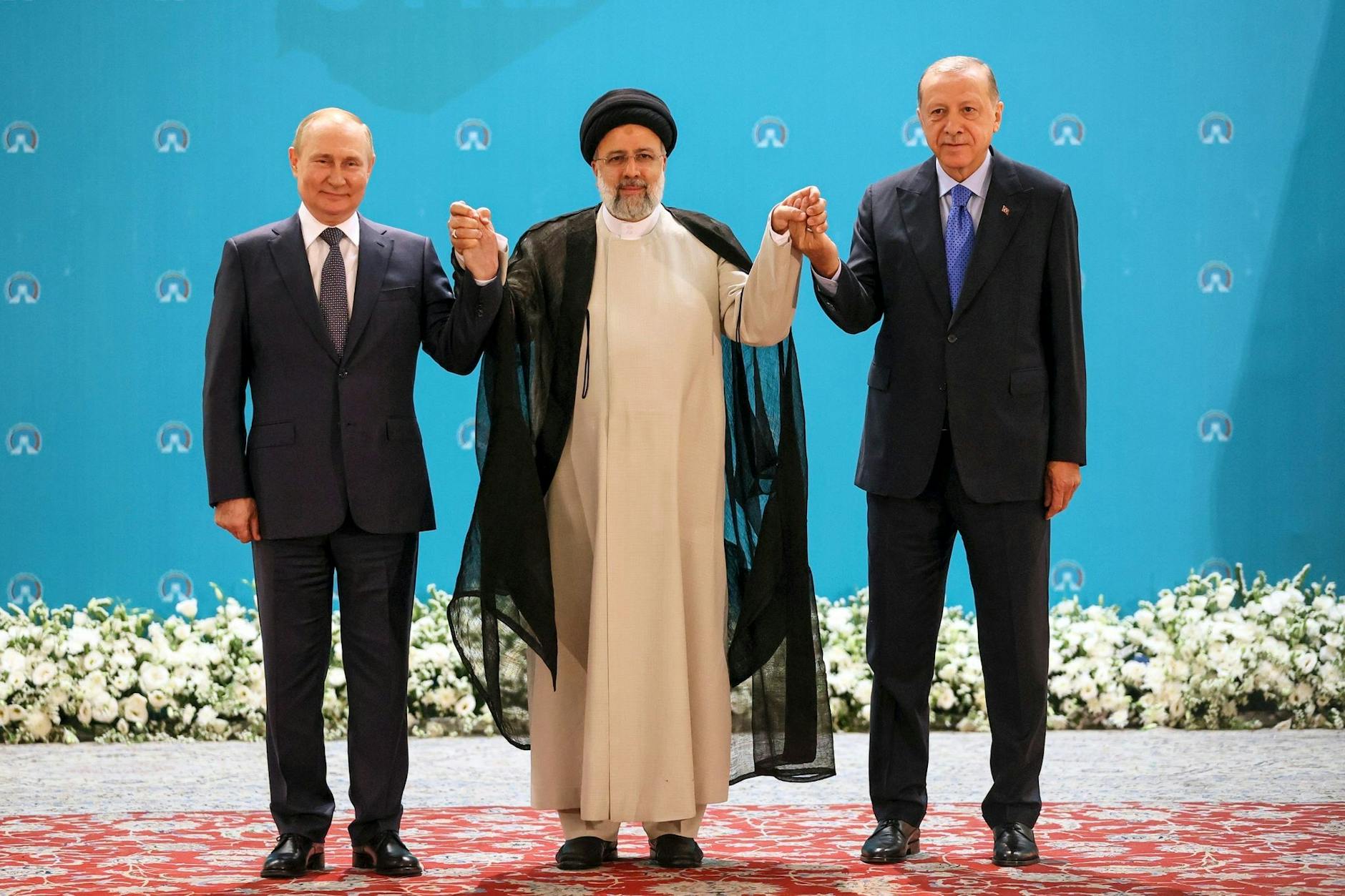 Der russische Präsident Wladimir Putin, Ebrahim Raisi, Präsident des Iran, und ihr türkischer Kollege Recep Tayyip Erdogan bei ihrem Treffen in Teheran. Kremlin via AP/dpa