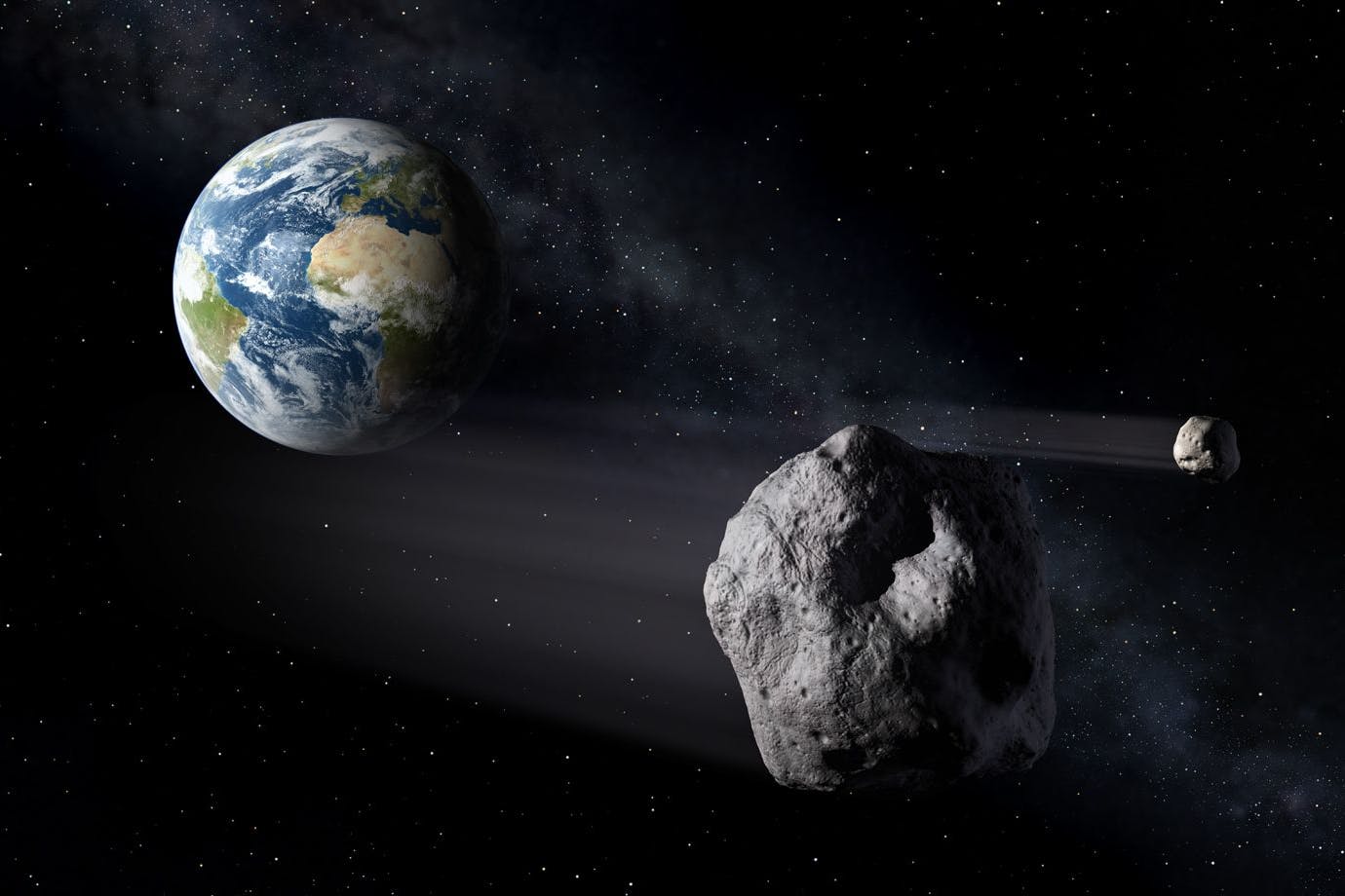 Das Foto der European Space Agency zeigt eine simulierte Begegnung von Asteroiden mit der Erde.