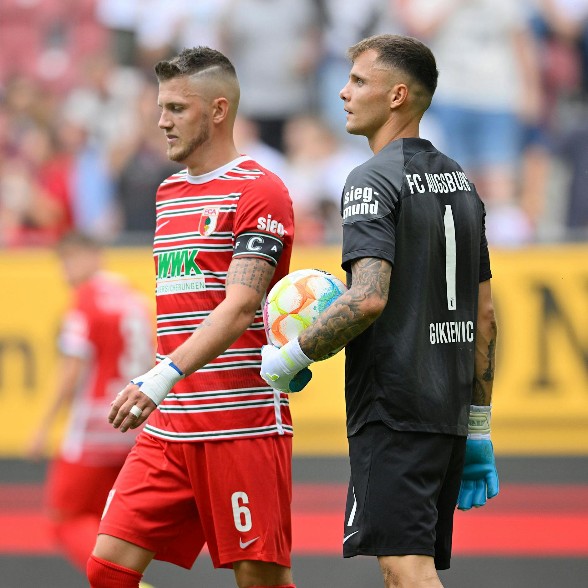 Augsburgs Kapitän Gouweleeuw bricht eine Lanze für Unions einstigen Aufstiegshelden Gikiewicz