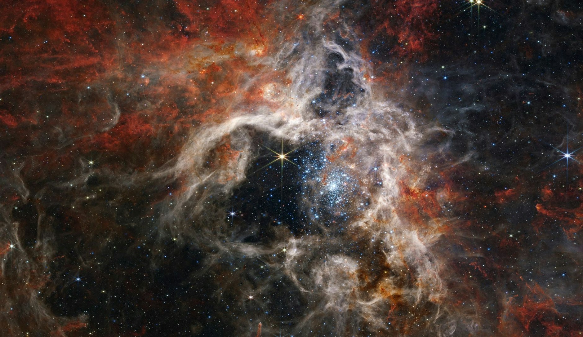ARCHIV - Dieses von der NASA veröffentlichte Bild zeigt die Sternentstehungsregion des Tarantula-Nebels, aufgenommen vom James Webb Space Telescope.   ERO Production Team/AP/dpa
