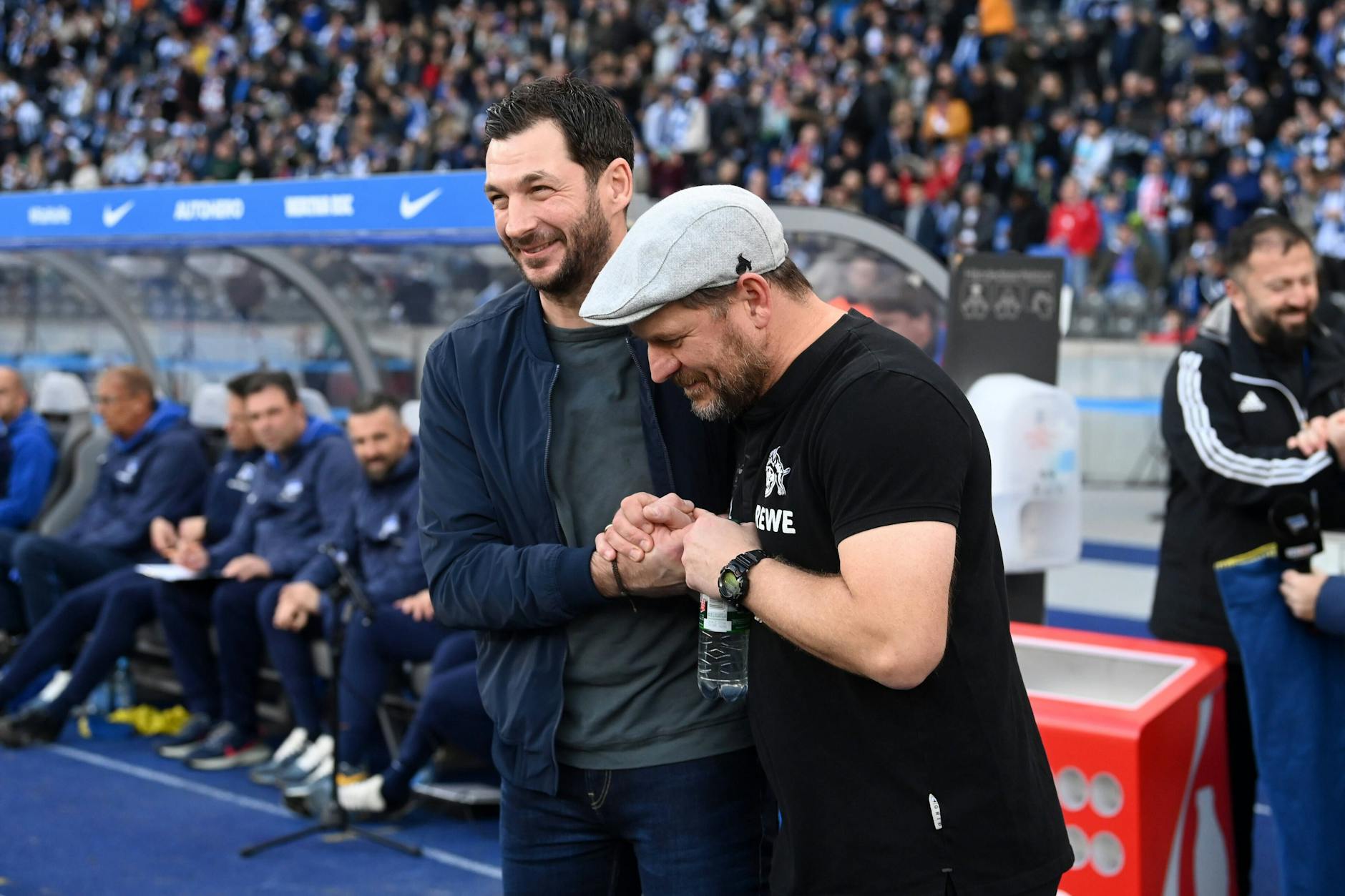 Sandro Schwarz und Steffen Baumgart verstehen sich gut. Einig sind die beiden Trainer sich auch, dass die WM niemals nach Katar hätte vergeben werden dürfen.