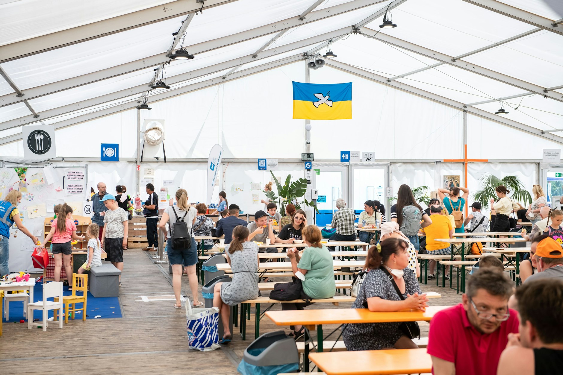 Geflüchtete aus der Ukraine bei ihrer Ankunft in Berlin. Viele von ihnen sind mittlerweile gut integriert.