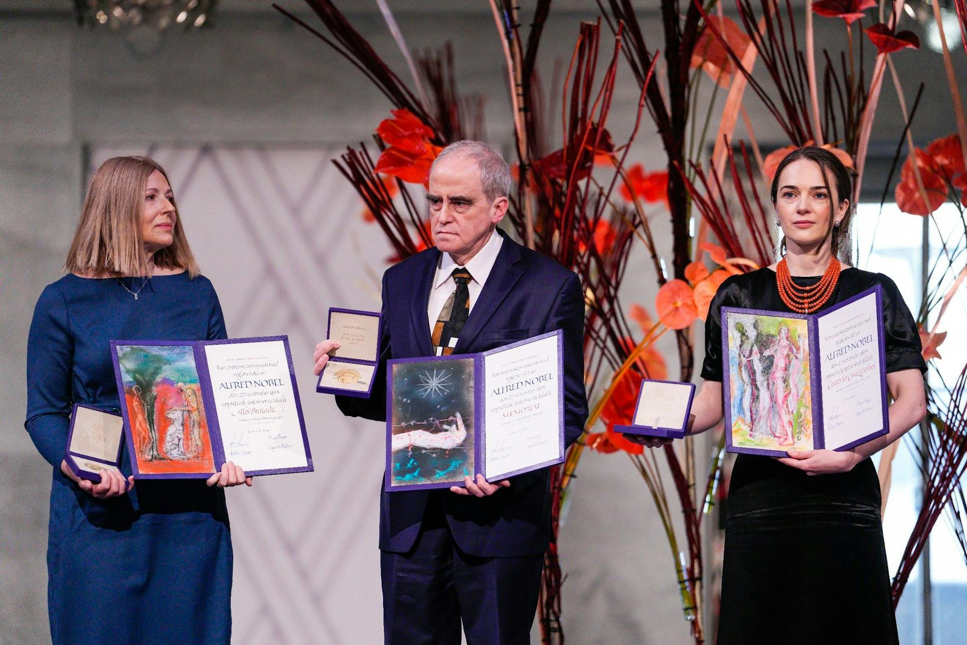 Oleksandra Matviichuk (right) with Natalia Pinchuk (left), wife of the Belarussian activist Ales Bialiatski, and Yan Ratshinsky (centre) of the Russian human rights organisation Memorial at the Nobel Peace Prize ceremony in Oslo on 10th December. 