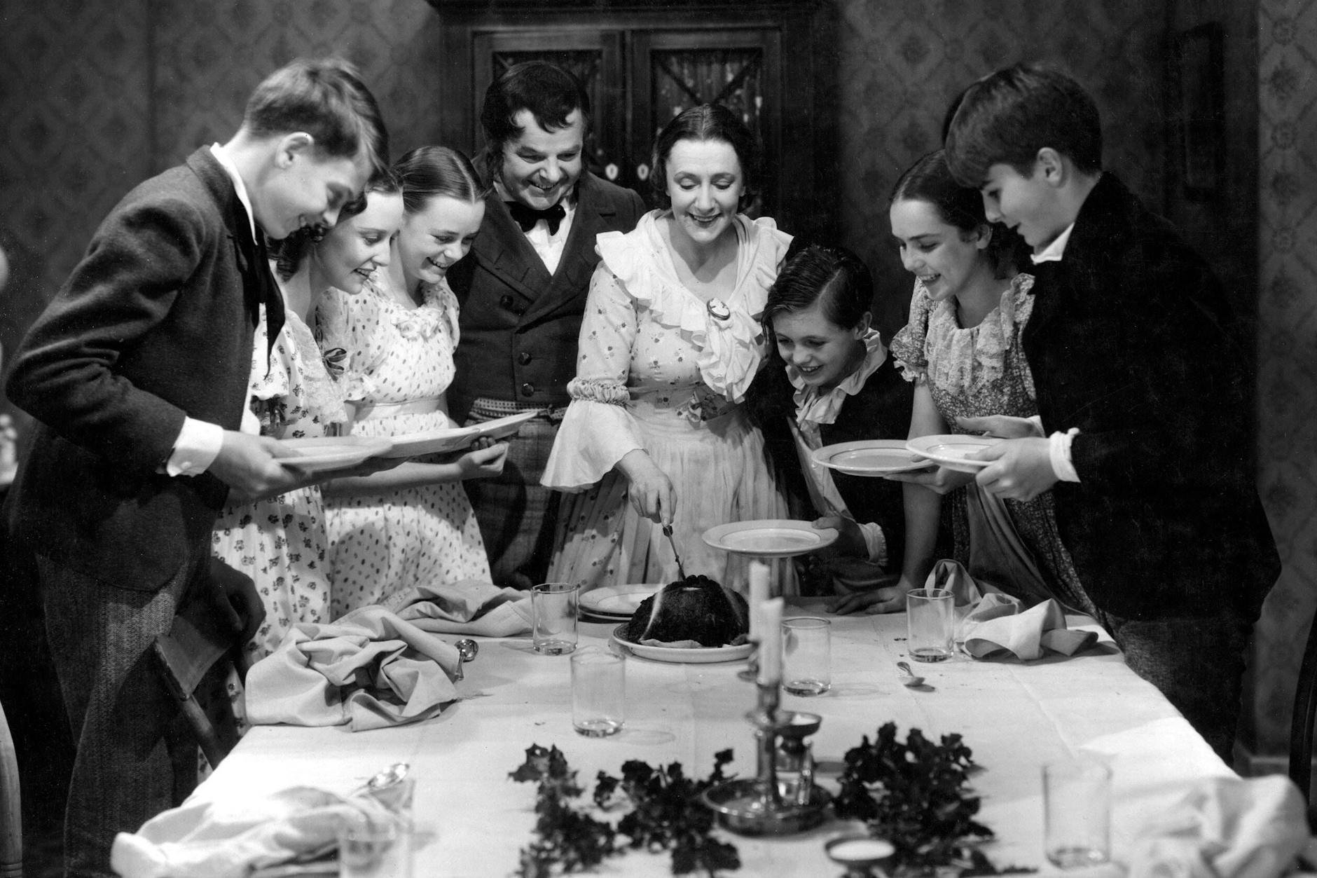 Noch lachen sie ... Nach dem Festmahl aber, hier im Film „A Christmas Carol“, geht’s nicht jedem gut.