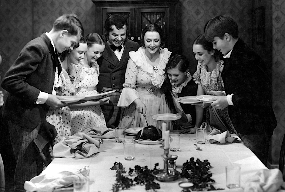 Noch lachen sie ... Nach dem Festmahl aber, hier im Film „A Christmas Carol“, geht’s nicht jedem gut.