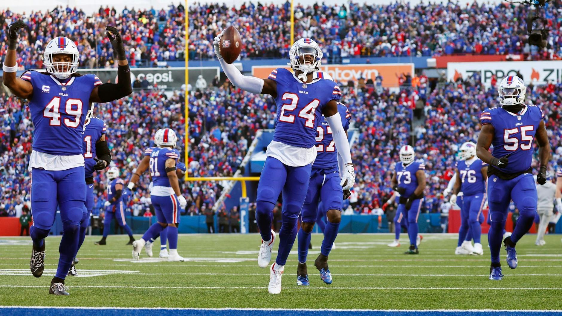Die Spieler der Buffalo Bills feiern den Sieg gegen die Miami Dolphins. a