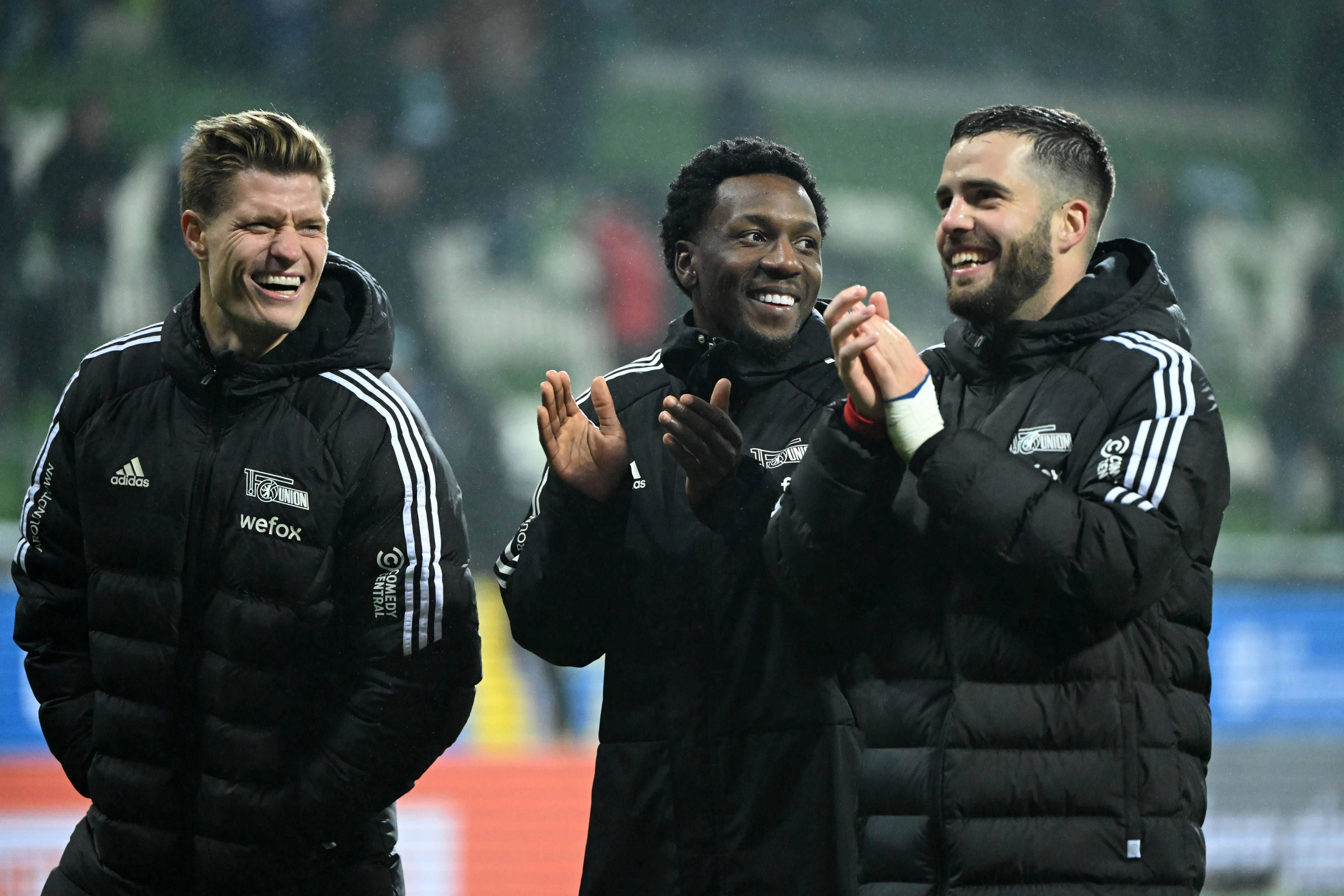 Grund zur Freude: Kevin Behrens (l.), Sheraldo Becker (M.) und Niko Gießelmann beendeten die Hinrunde mit Union Berlin auf einem starken zweiten Platz.