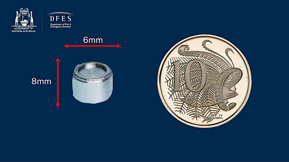 A supplied image obtained on Friday, January 27, 2023, of a small round and silver capsule containing radioactive Caesium-137 that went missing in transportation between a mine site north of Newman and the north-eastern parts of Perth between 10-16 January. Radiation surveys are underway along stretches of outback highways in Western Australia after a radioactive capsule went missing from a truck. (AAP Image/Supplied by Department of Fire and Emergency Services WA) NO ARCHIVING, EDITORIAL USE ONLY