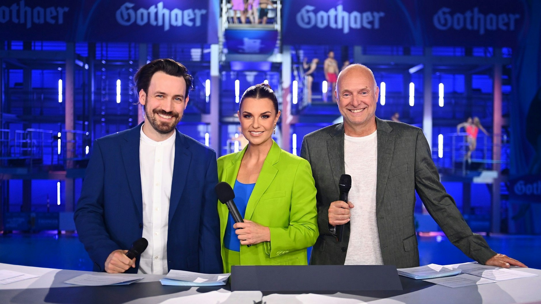 Werden das RTL-Turmspringen moderieren: Jan Köppen, Laura Wontorra und Frank Buschmann (v.l.).