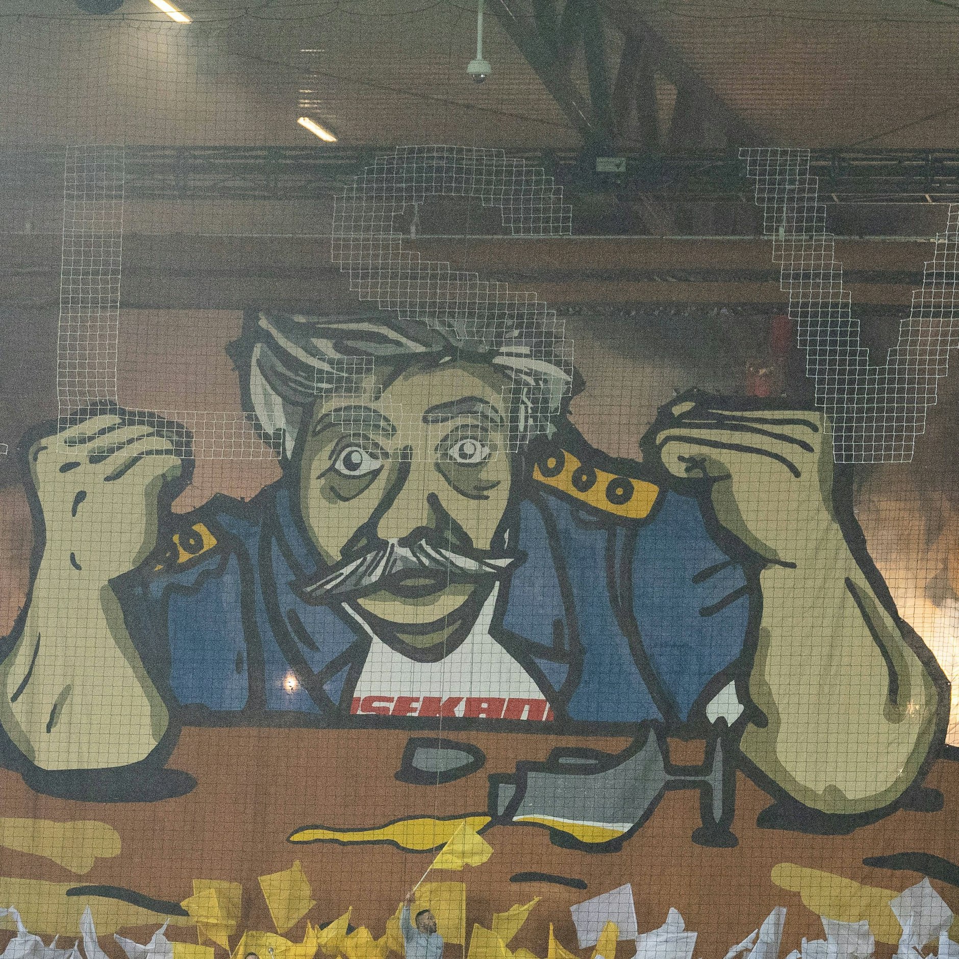 Die Choreografie der Fans des 1. FC Union vor dem Spiel gegen Ajax Amsterdam. Der Hauptmann von Köpenick erwacht aus unruhigem Schlaf und sieht sich mit seinen kühnsten Träumen konfrontiert.