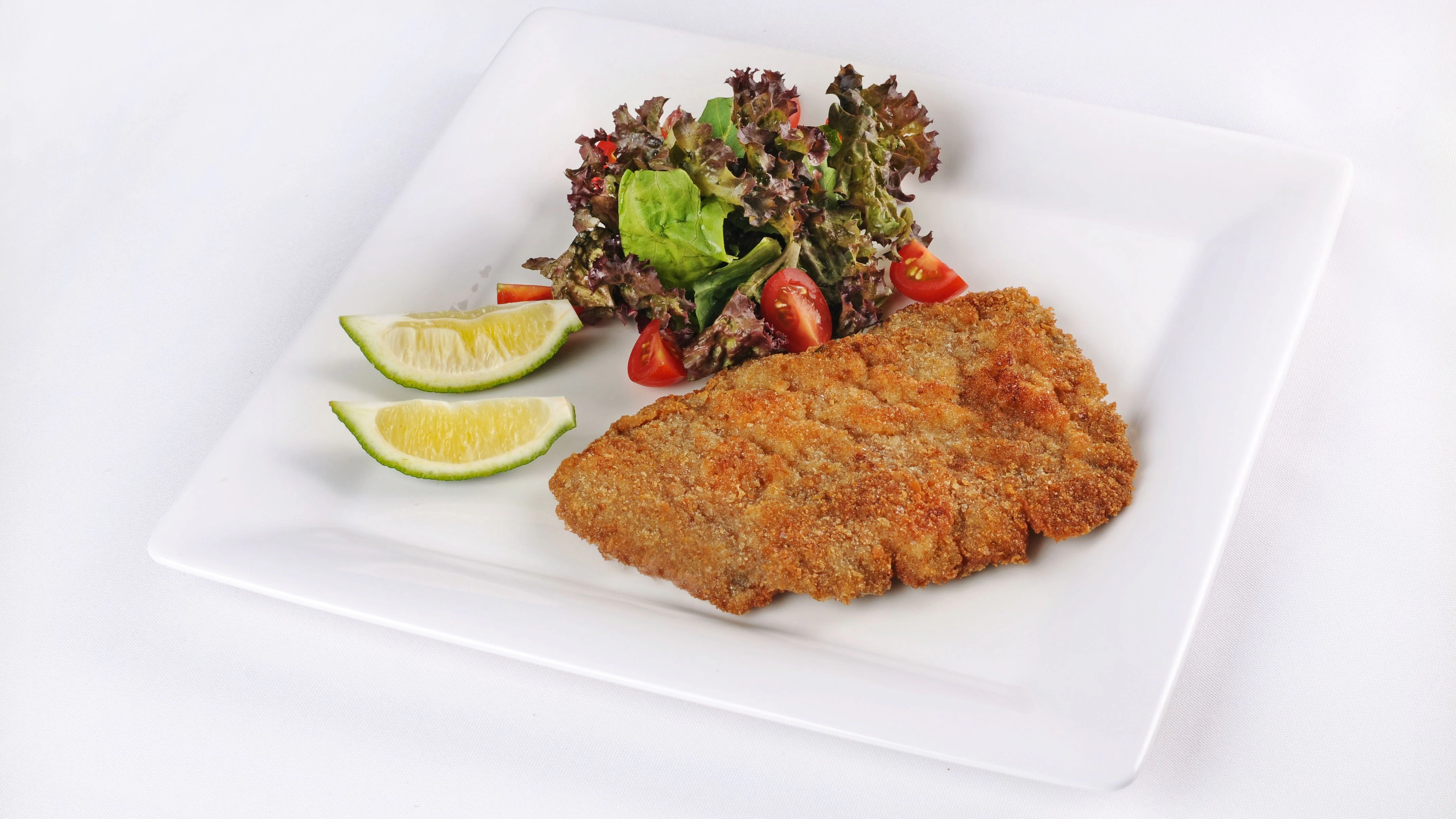 Dieses Rezept für Schnitzel aus dem Backofen ist so genial, weil das Fett nicht durch die ganze Küche spritzt.